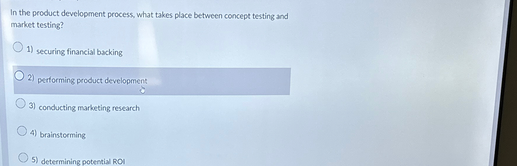 In the product development process, what takes place between concept testing and