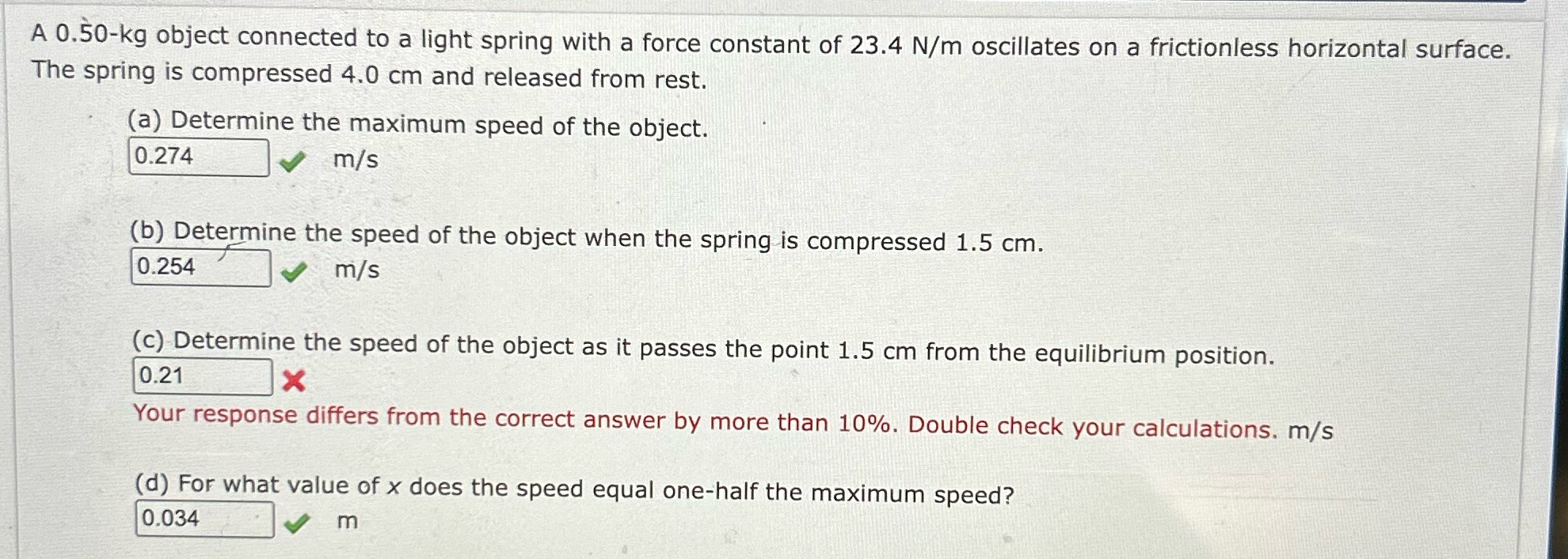 A 0.50-kg object connected to a light spring with a force constant