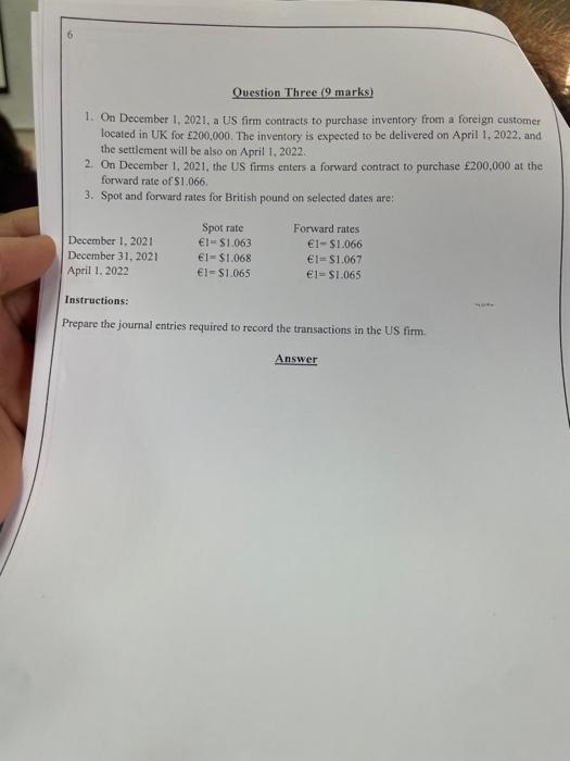 Question Three (9 marks) 1. On December 1, 2021, a US firm