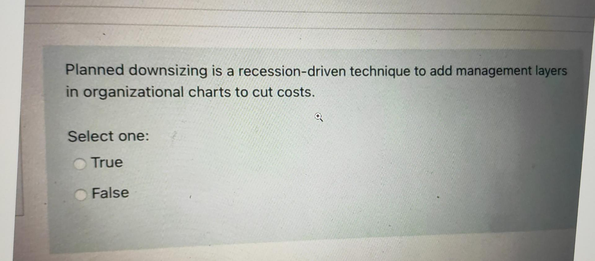 Planned downsizing is a recession-driven technique to add management layers in organizational