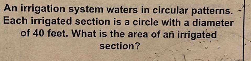An irrigation system waters in circular patterns. Each irrigated section is a