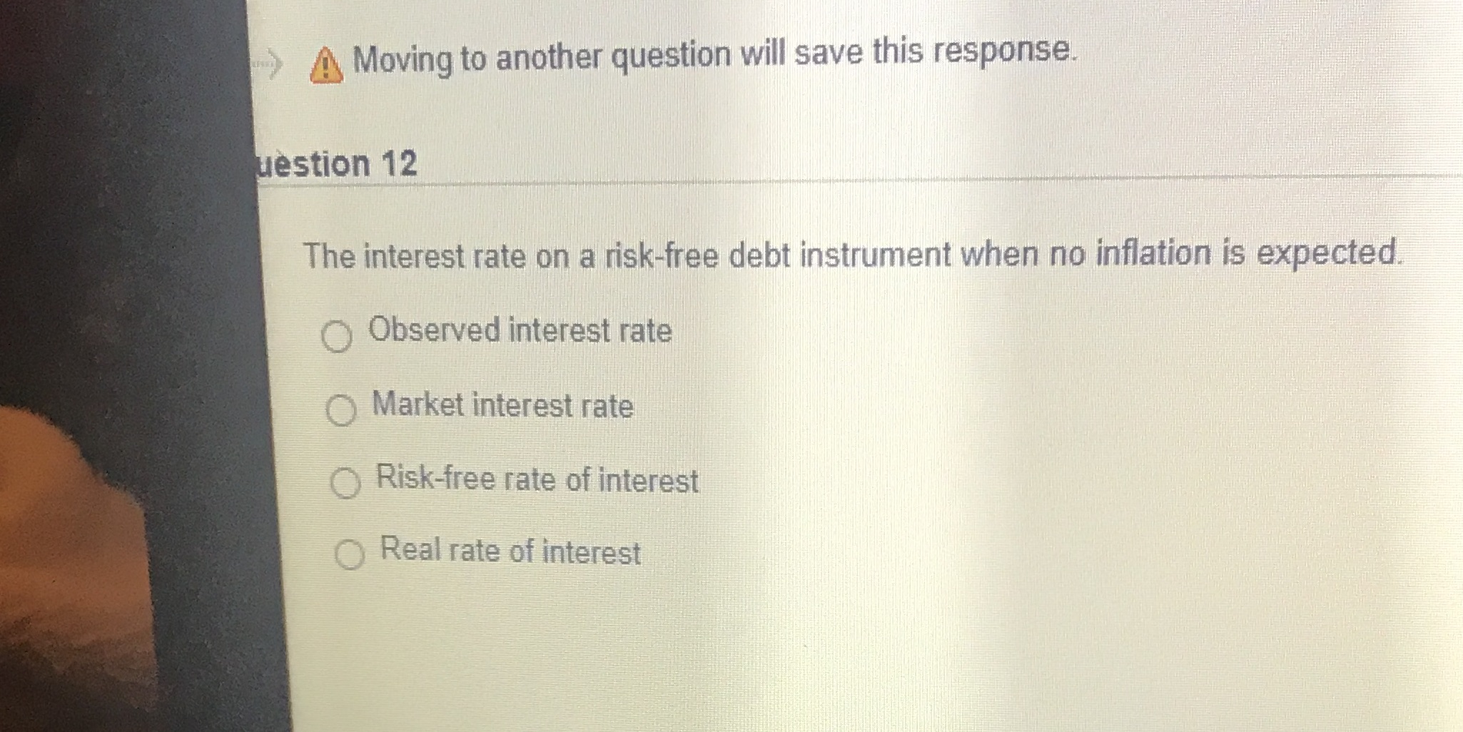 The interest rate on a risk-free debt instrument when no inflation is