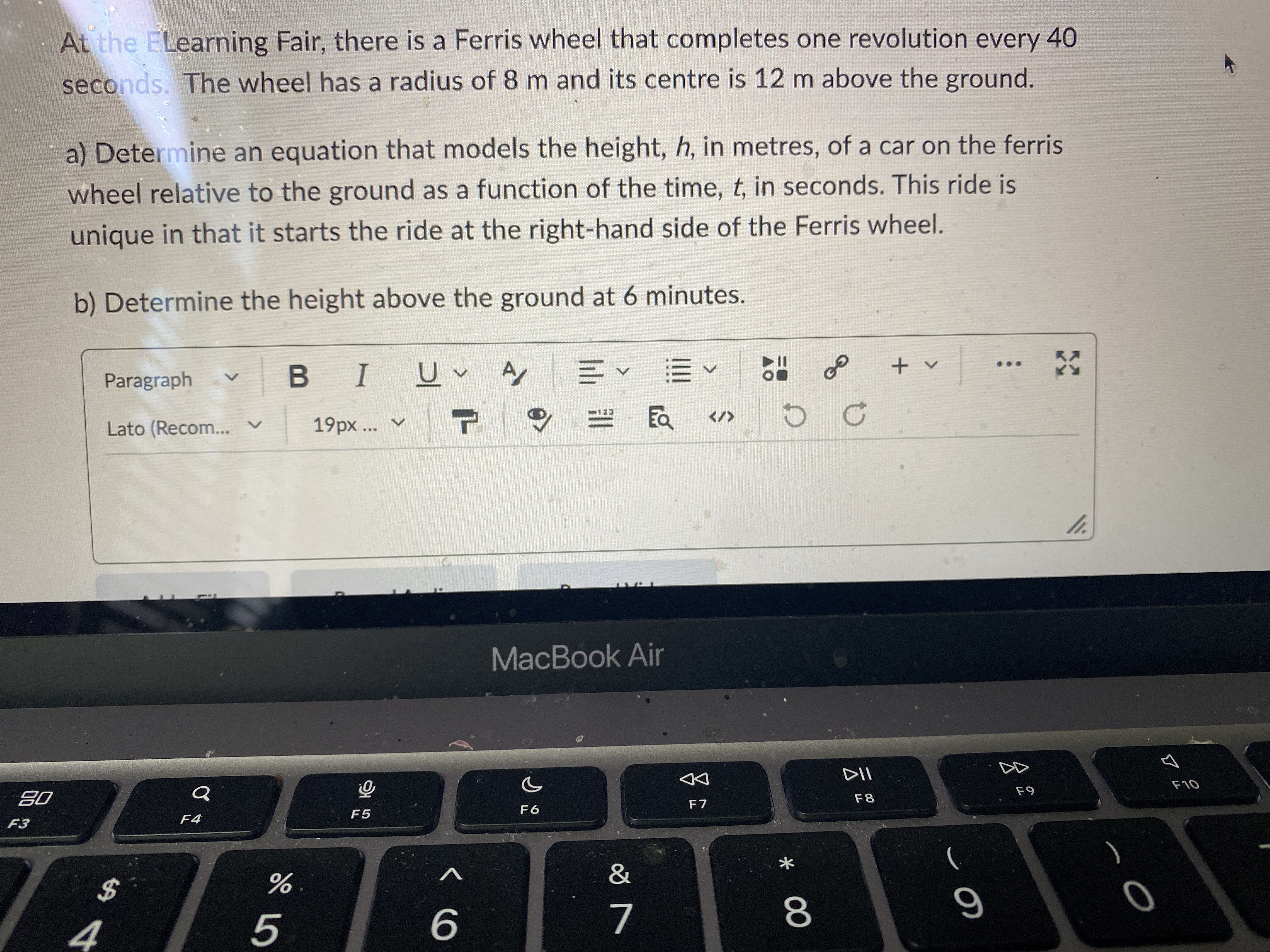 one revolution every 40 seconds. The wheel has a radius of 8