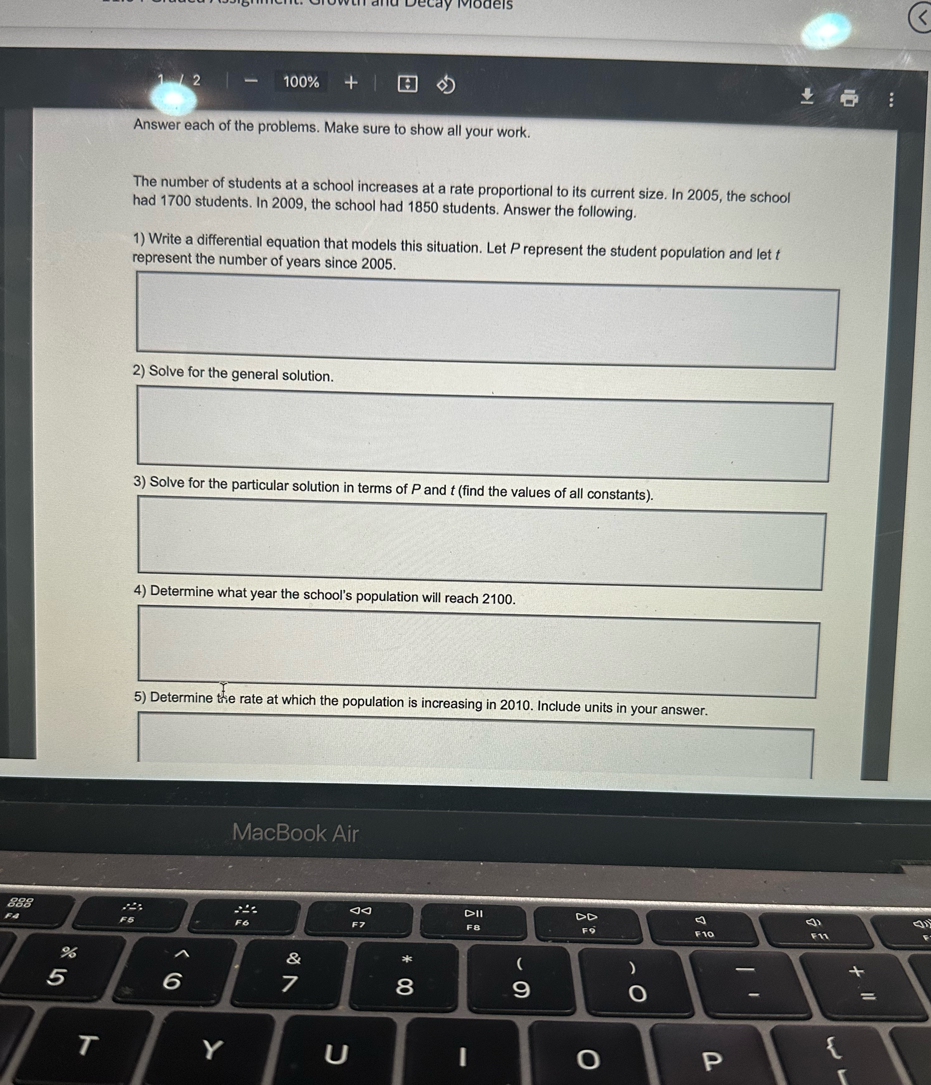 show all your work. The number of students at a school increases