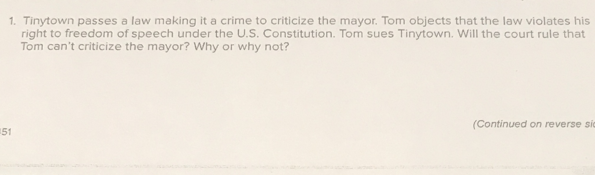 making it a crime to criticize the mayor. Tom objects that the