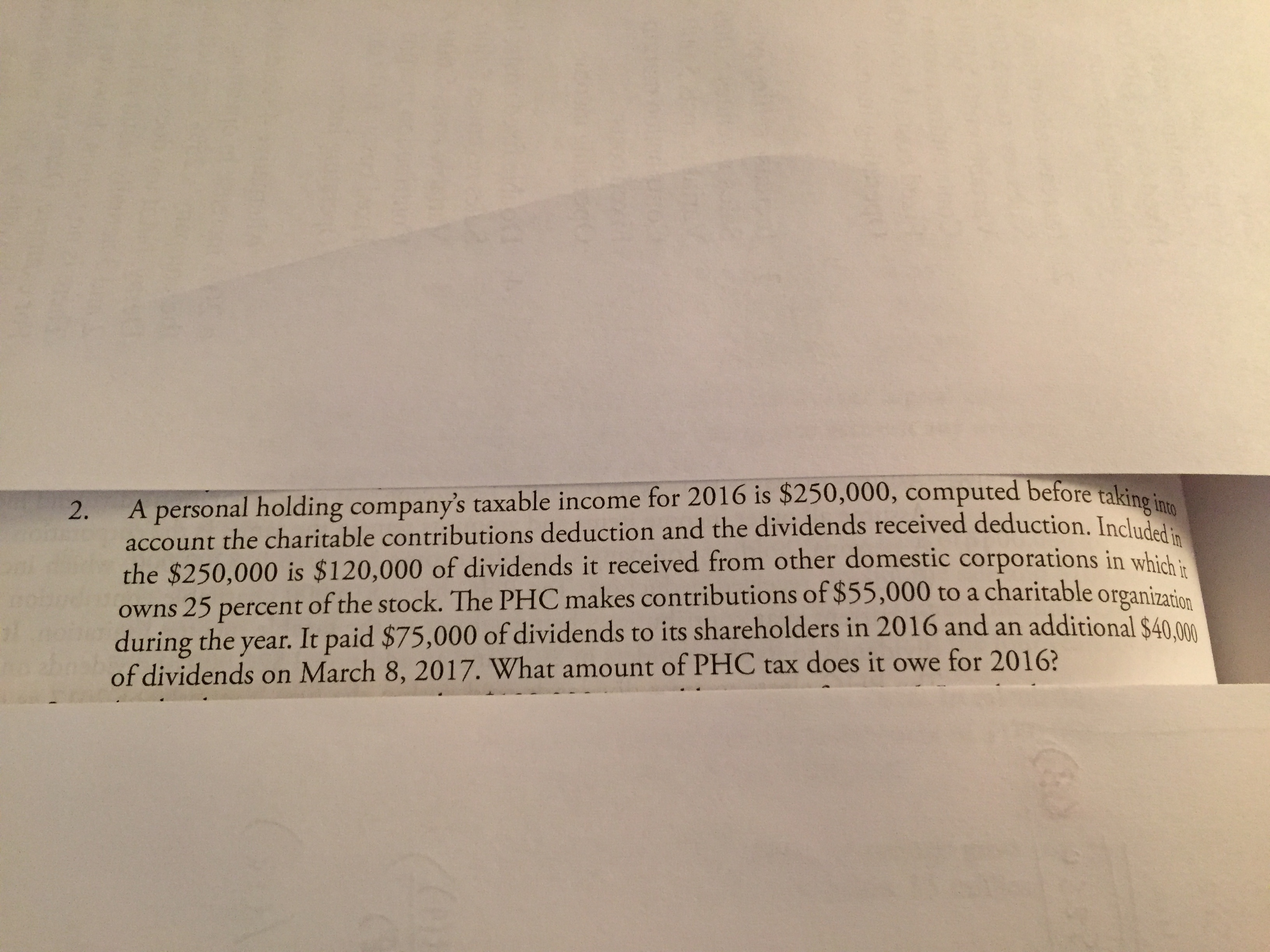 2. A personal holding company's taxable income for 2016 is $250,000, computed