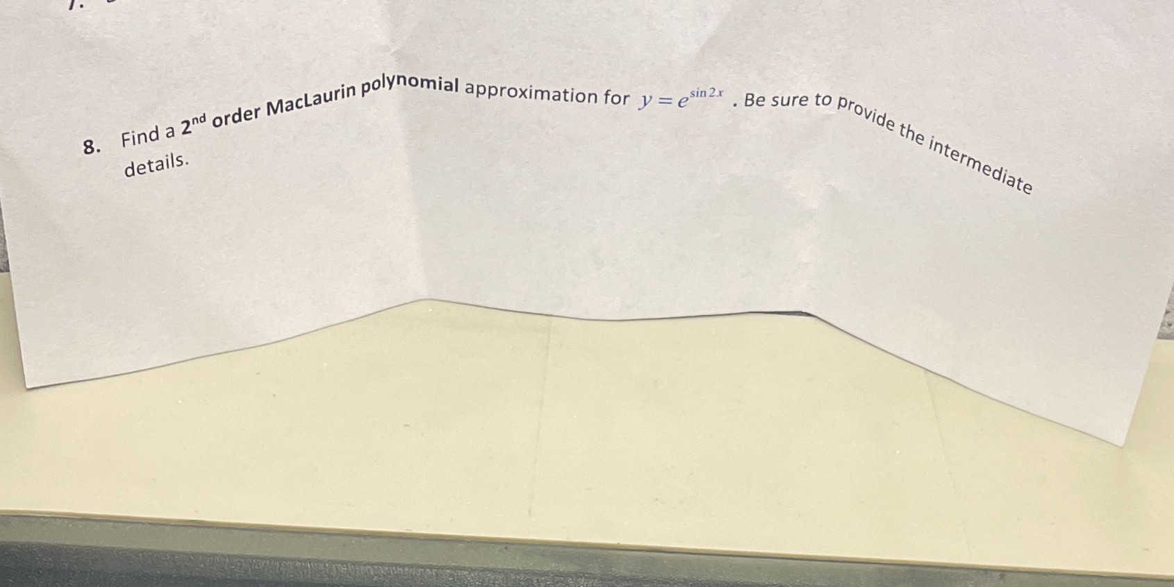  8. Find a 2nd order MacLaurin polynomial approximation for v =