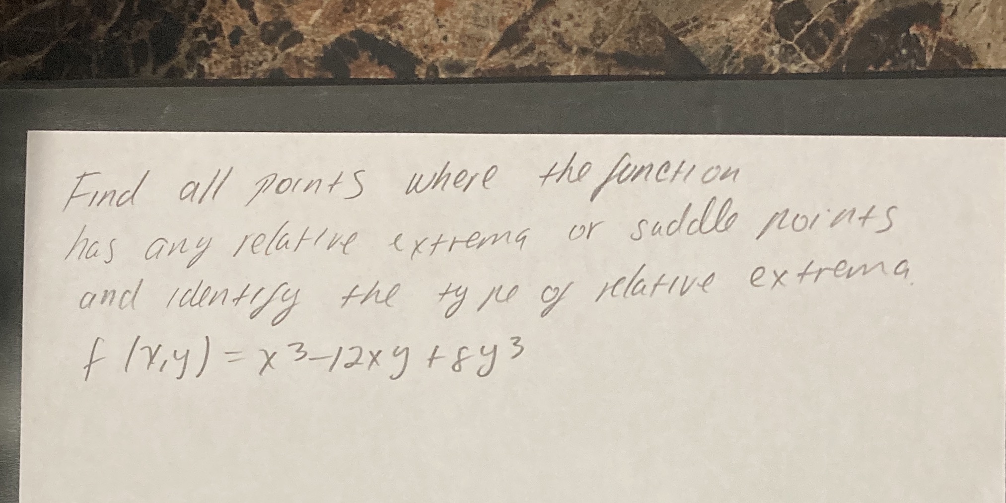 saddle points and identify the ty pe of relative extrema f (