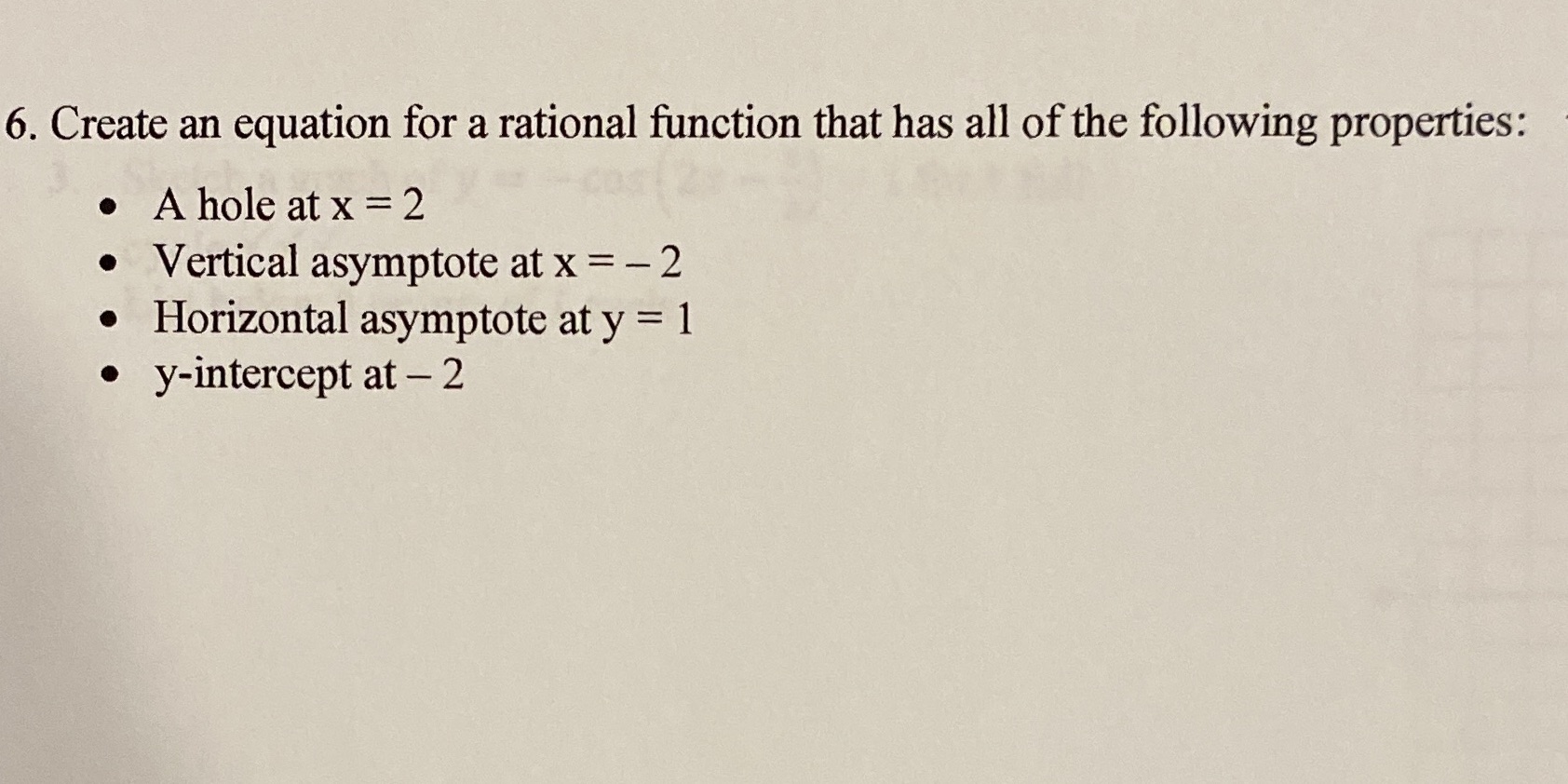 of the following properties: . A hole at x = 2 .