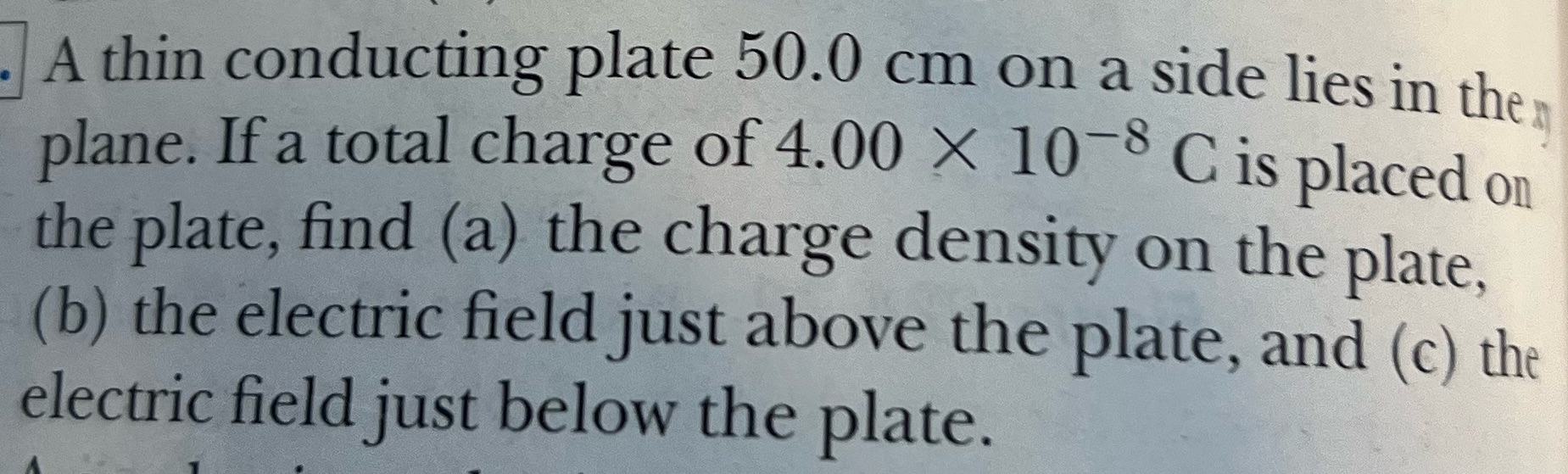 . A thin conducting plate 50.0 cm on a side lies