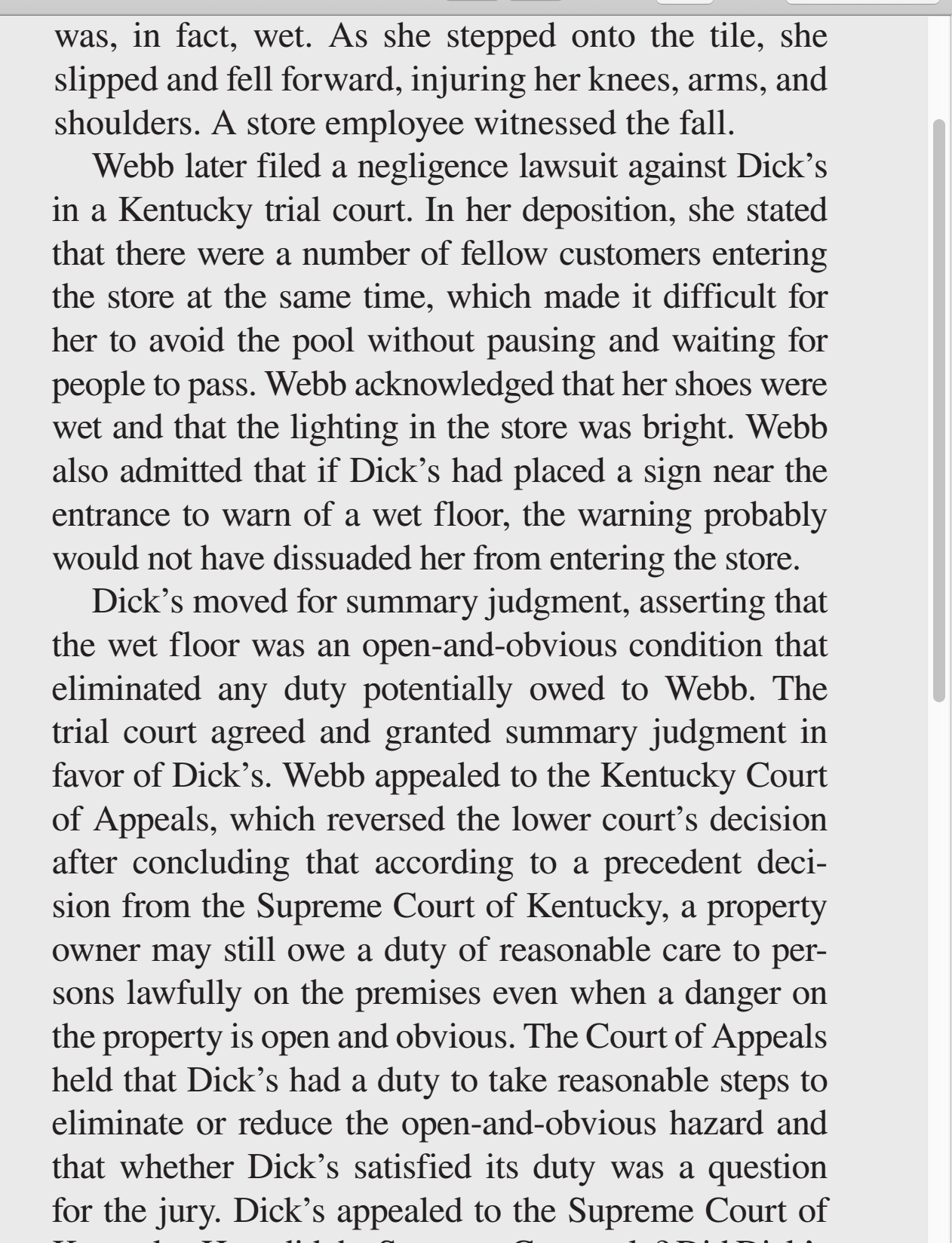 injuring her knees, arms, and shoulders. A store employee witnessed the fall.