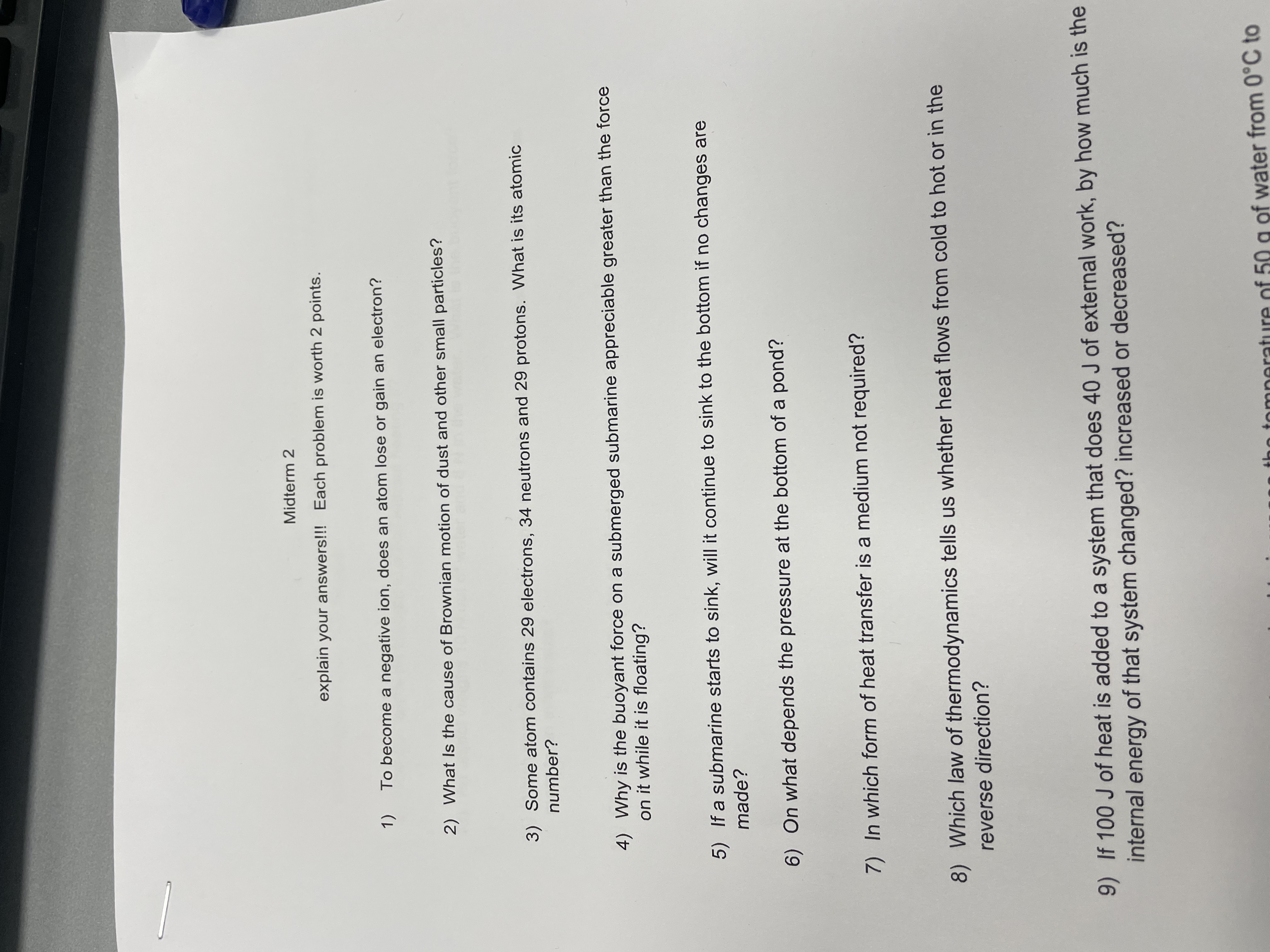 1) To become a negative ion, does an atom lose or gain