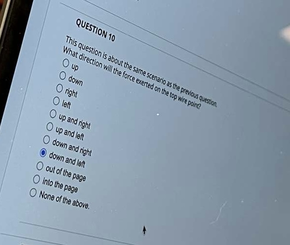 above. The figure shows a current ; In a uniform magness fed.