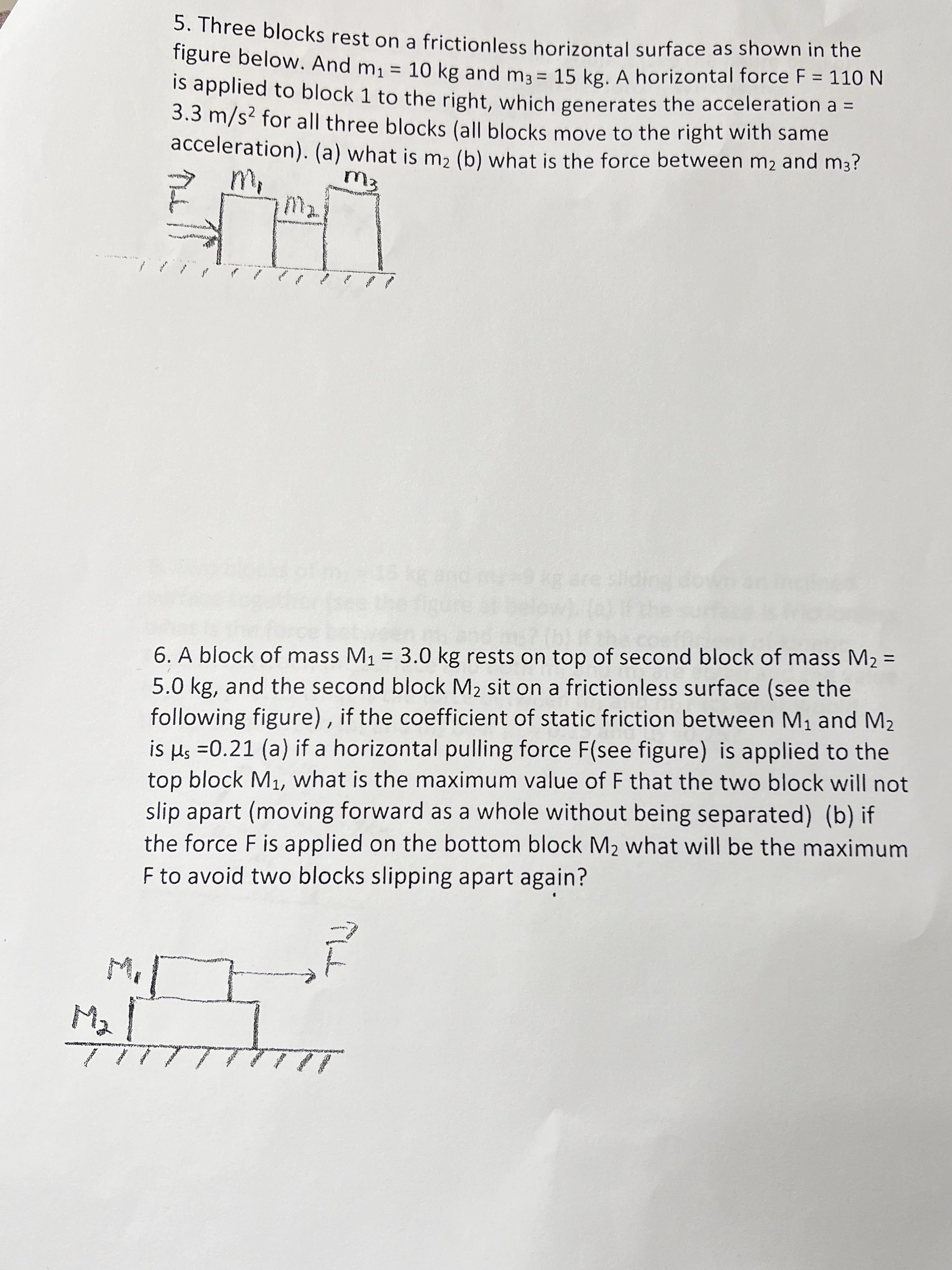 Physics question 5. Three blocks rest on a frictionless horizontal surface as