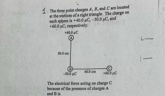 located at the vertices of a right triangle. The charge on each