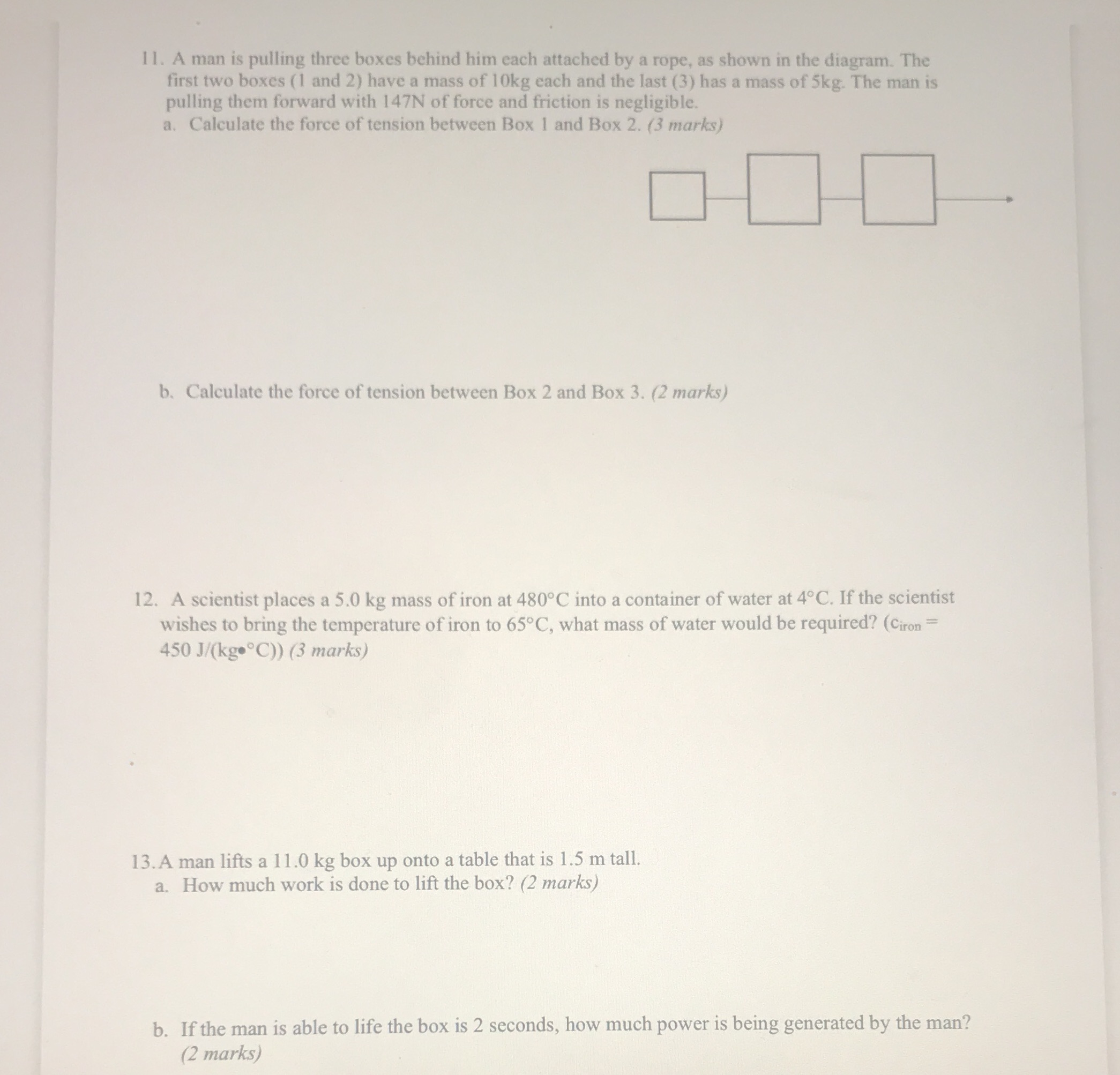 1 1. A man is pulling three boxes behind him each