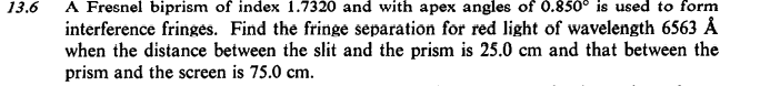 with green light from a cadmium-arc lamp. How far behind the slits