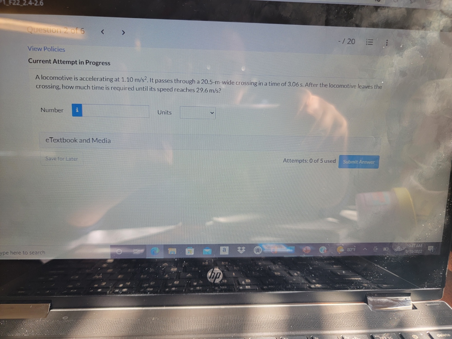 at 1.10 m/s2. It passes through a 20.5-muvide crossing in a time