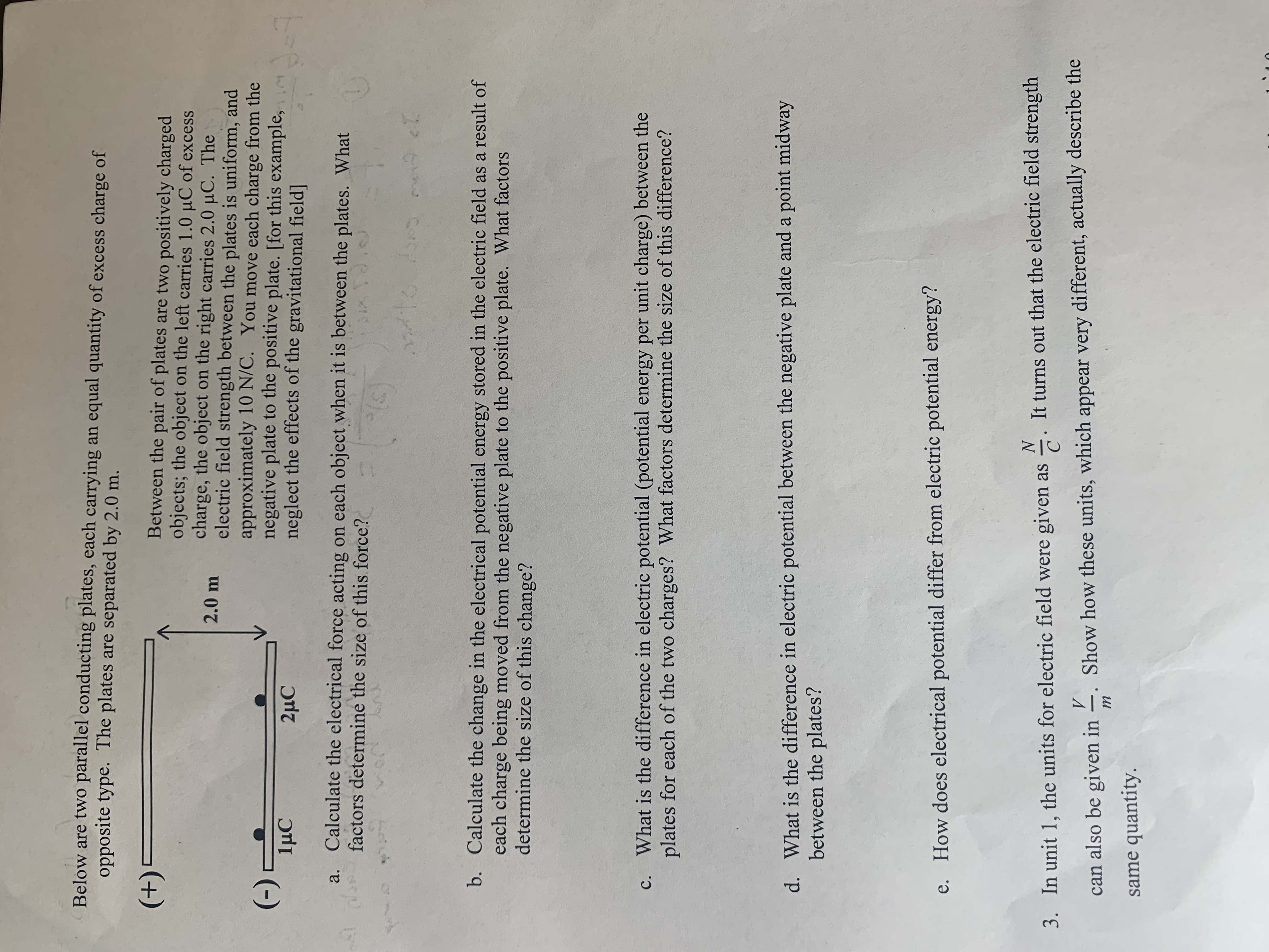 of excess charge of opposite type. The plates are separated by 2.0