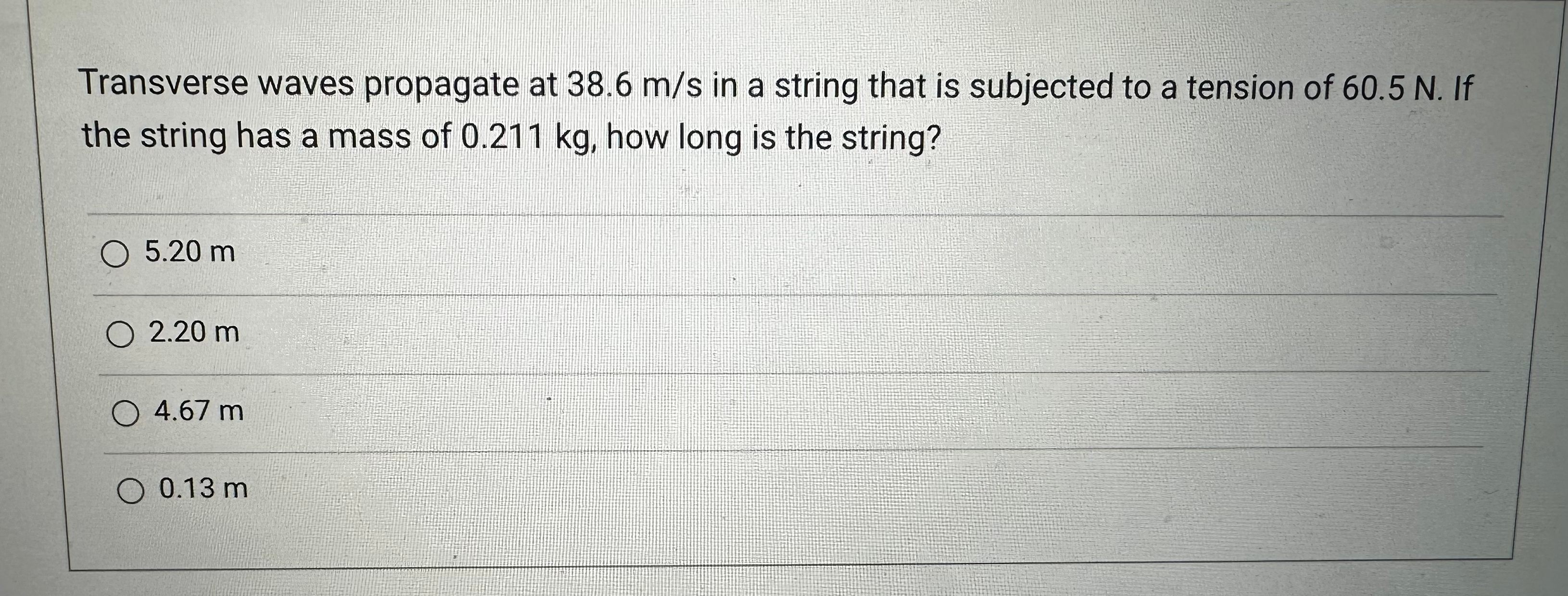  Transverse waves propagate at 38.6 m/s in a string that is