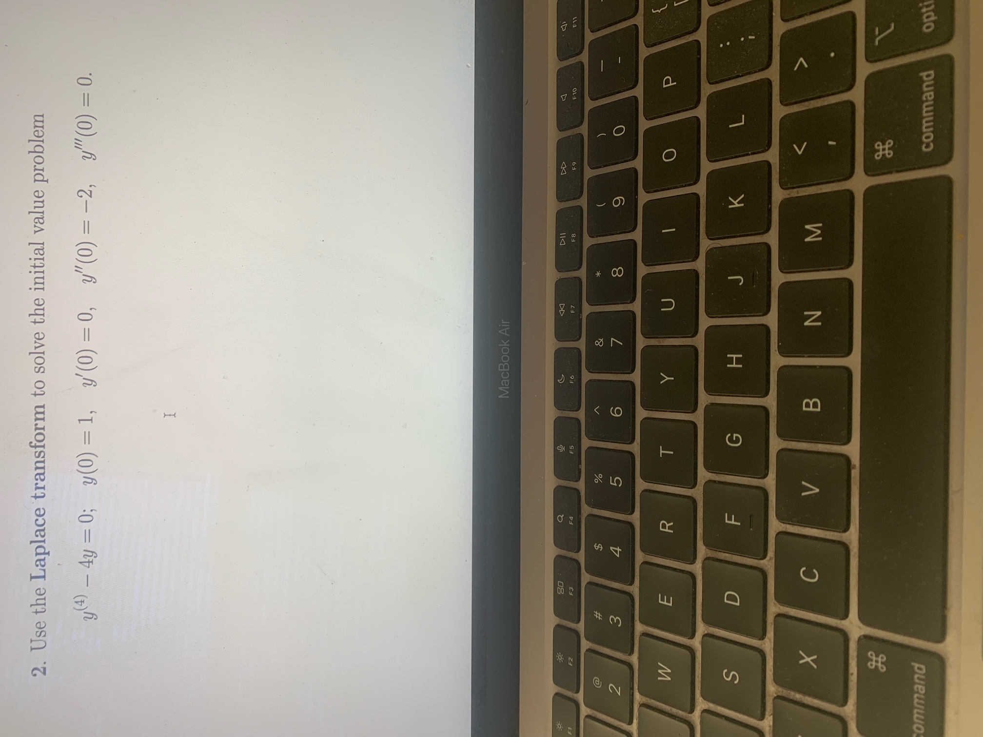  2. Use the Laplace transform to solve the initial value problem