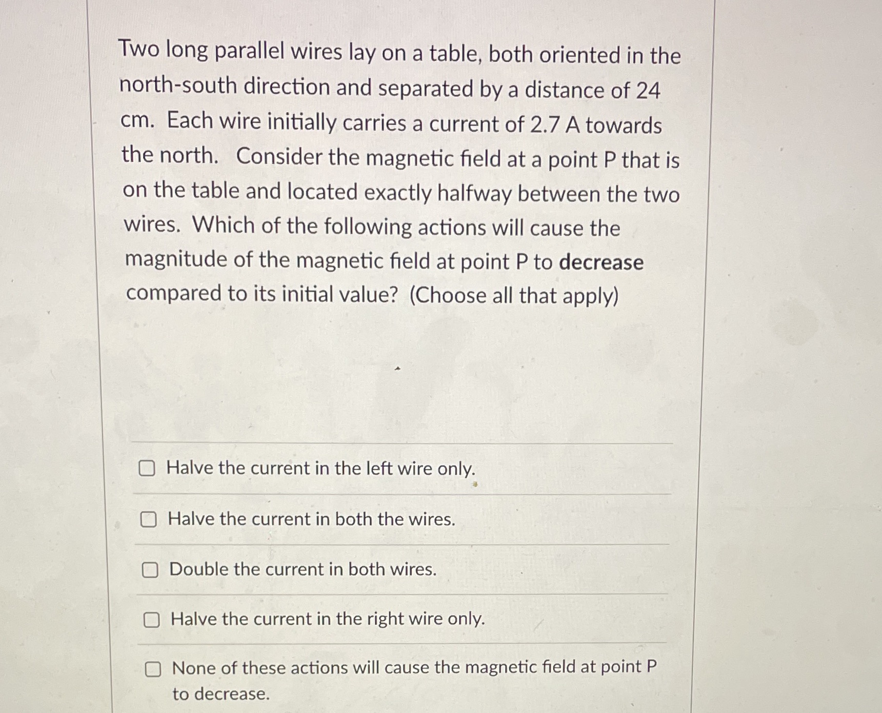  Two long parallel wires lay on a table, both oriented in