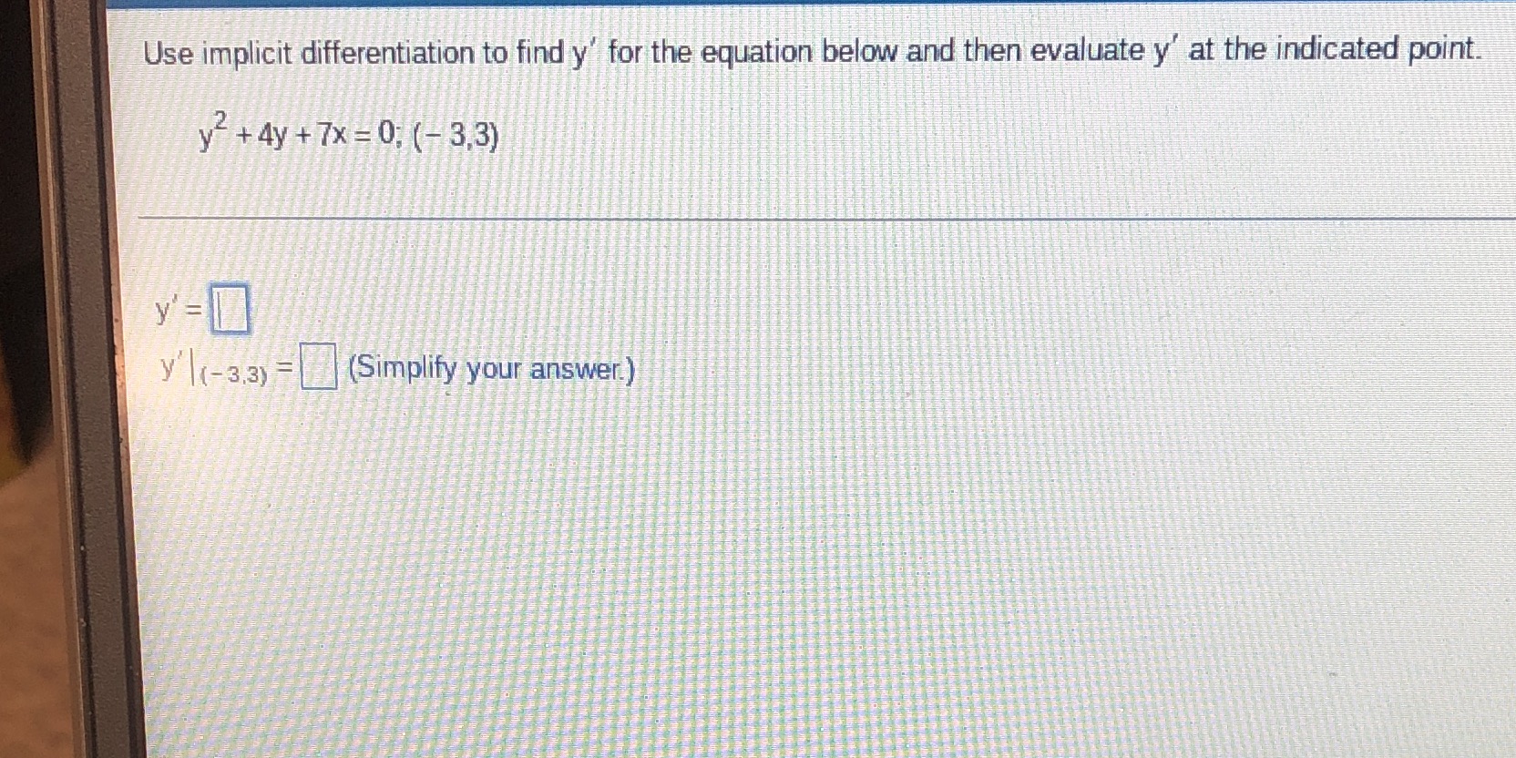 Use implicit differentiation to find y' for the equation below and