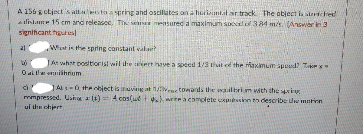 on a horizontal air track. The object is stretched a distance 15