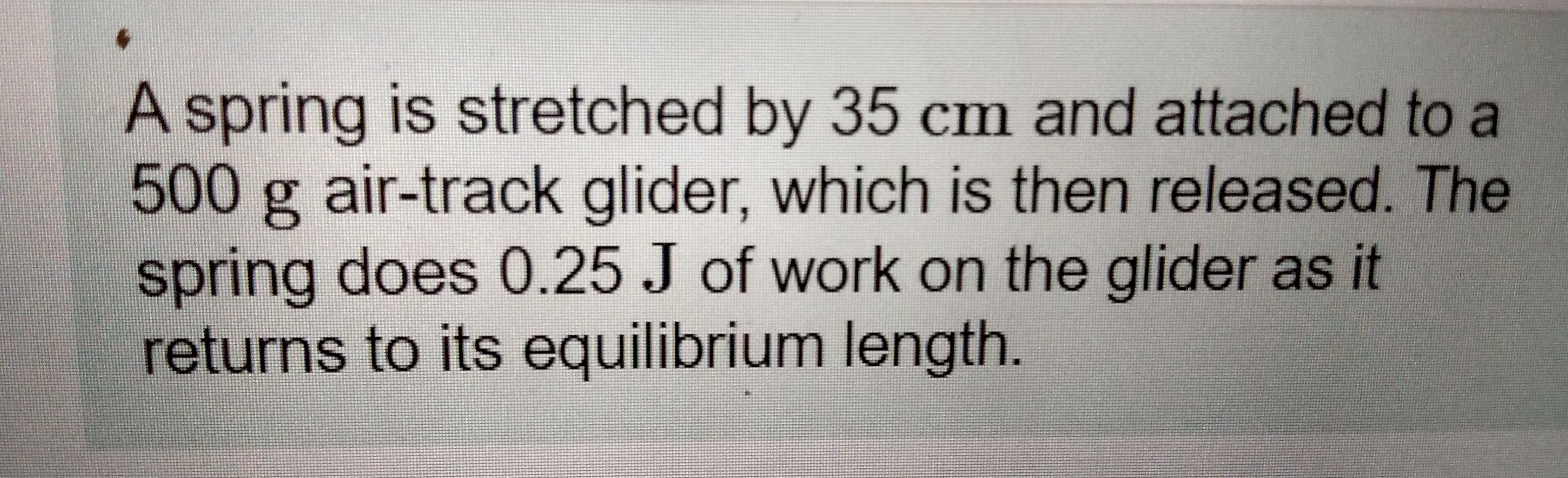 J of work on the glider as it returns to its equilibrium