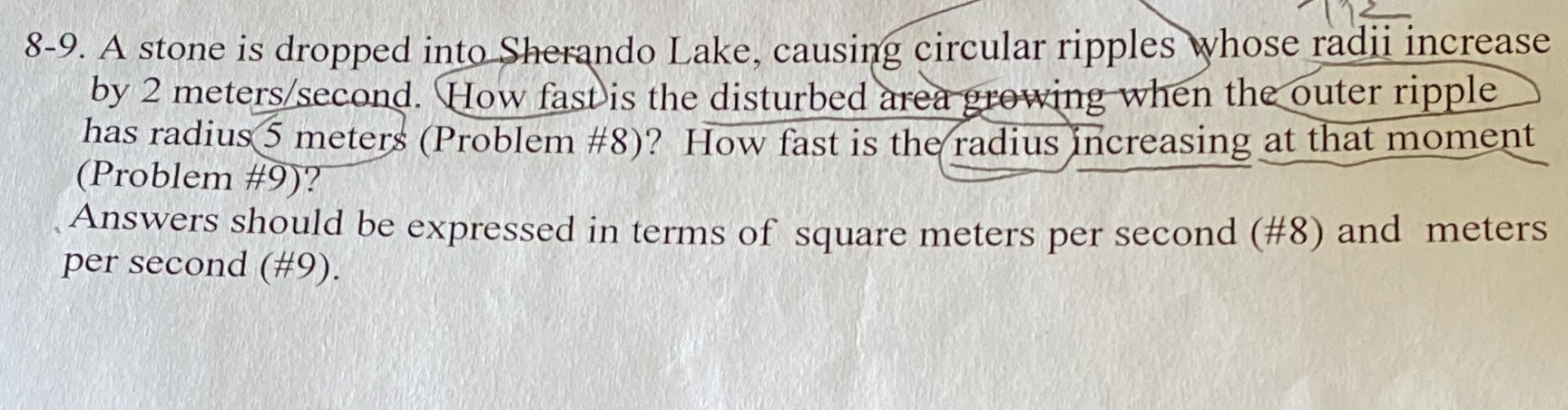  8-9. A stone is dropped into Sherando Lake, causing circular ripples