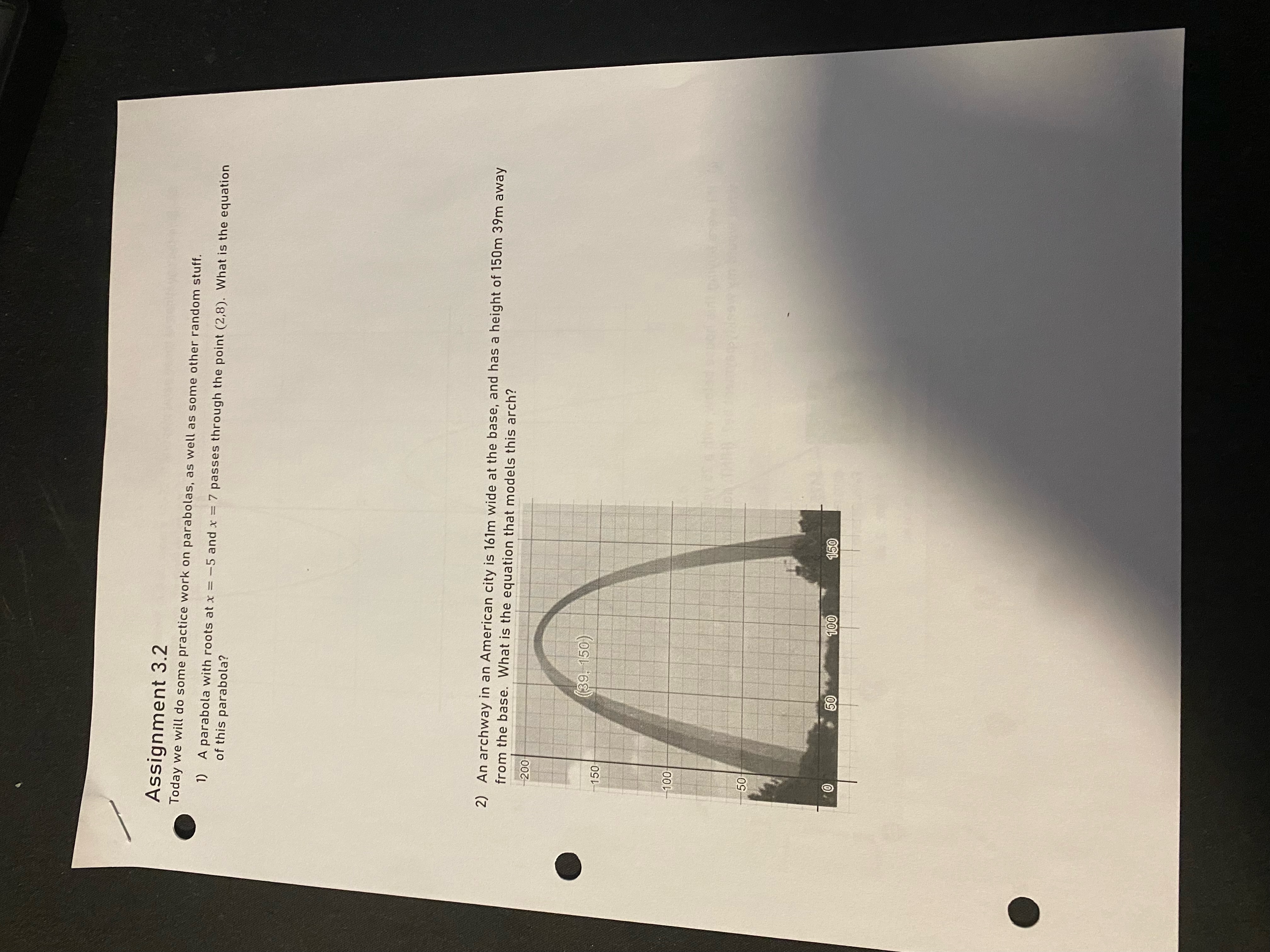 at x = -5 and x = 7 passes through the point