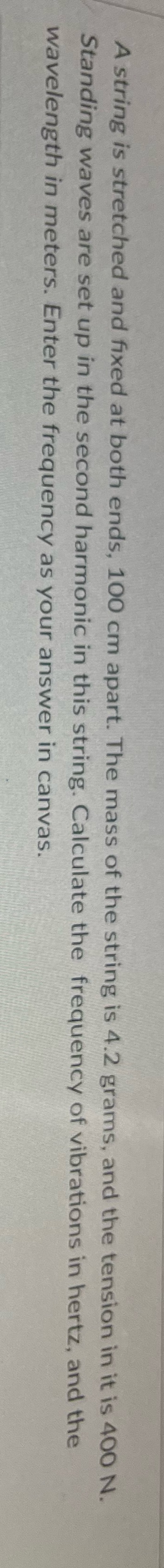 A string is stretched and fixed at both ends, 100 cm