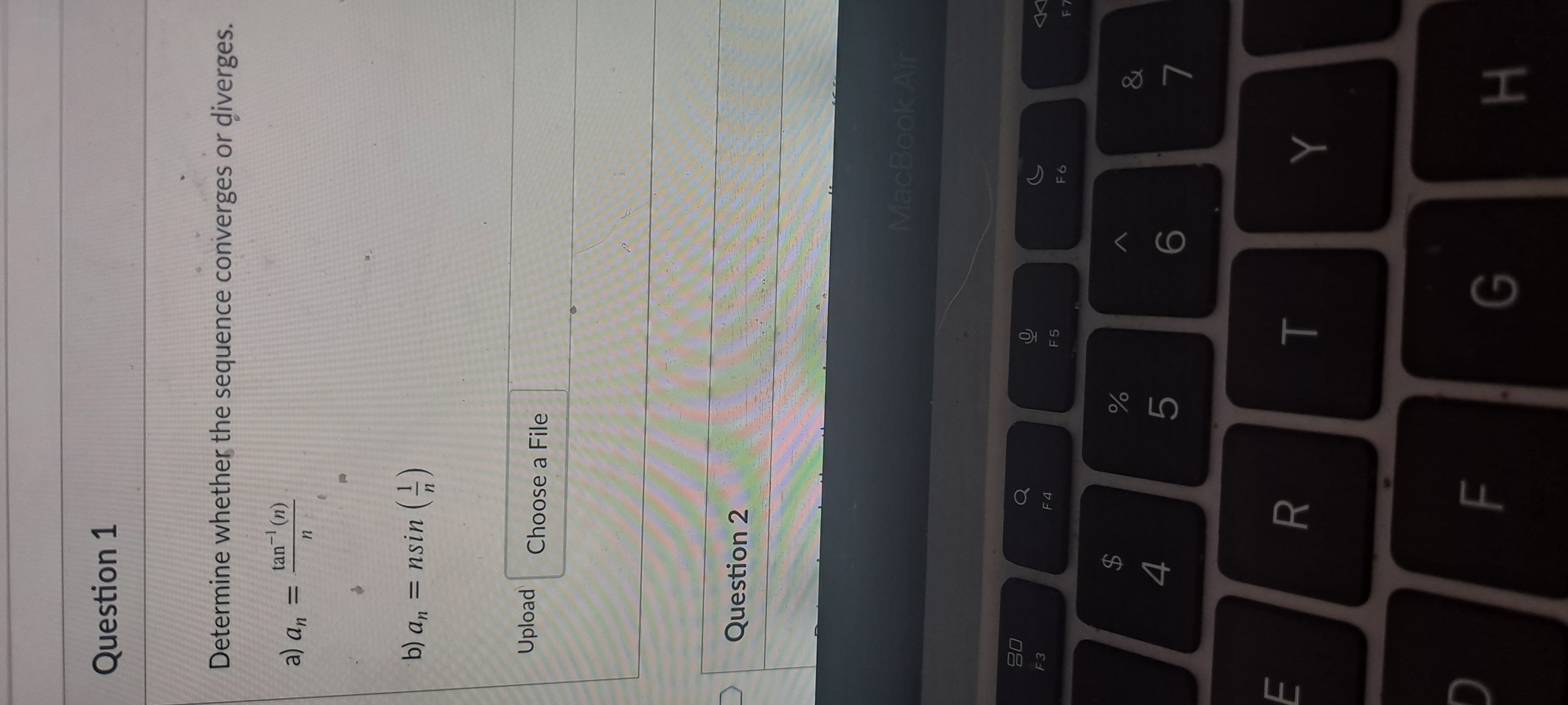 Question 1 Determine whether the sequence converges or diverges. tan (n)