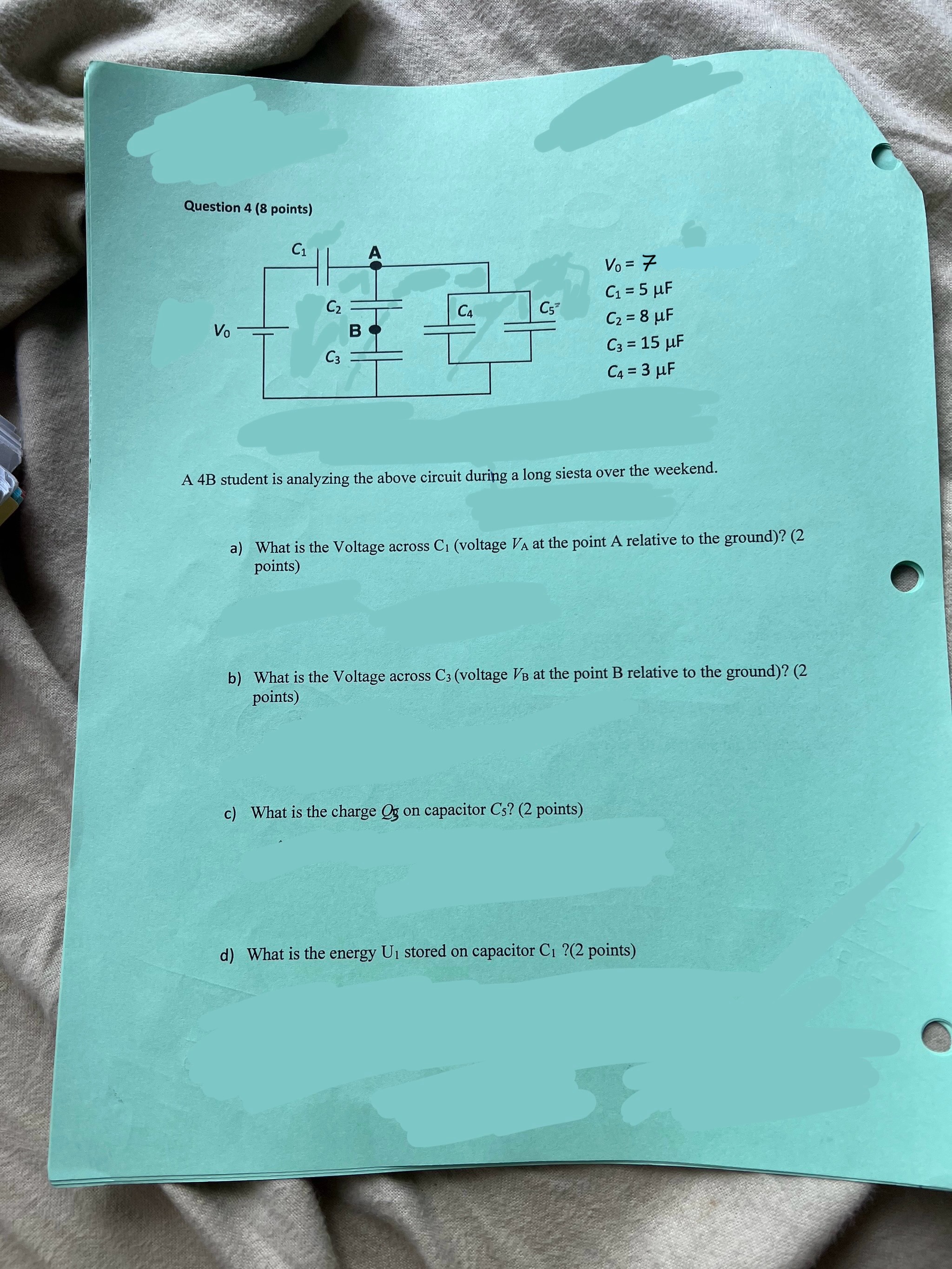 charges fixed in place, a third point charge q3=-3 uC with a
