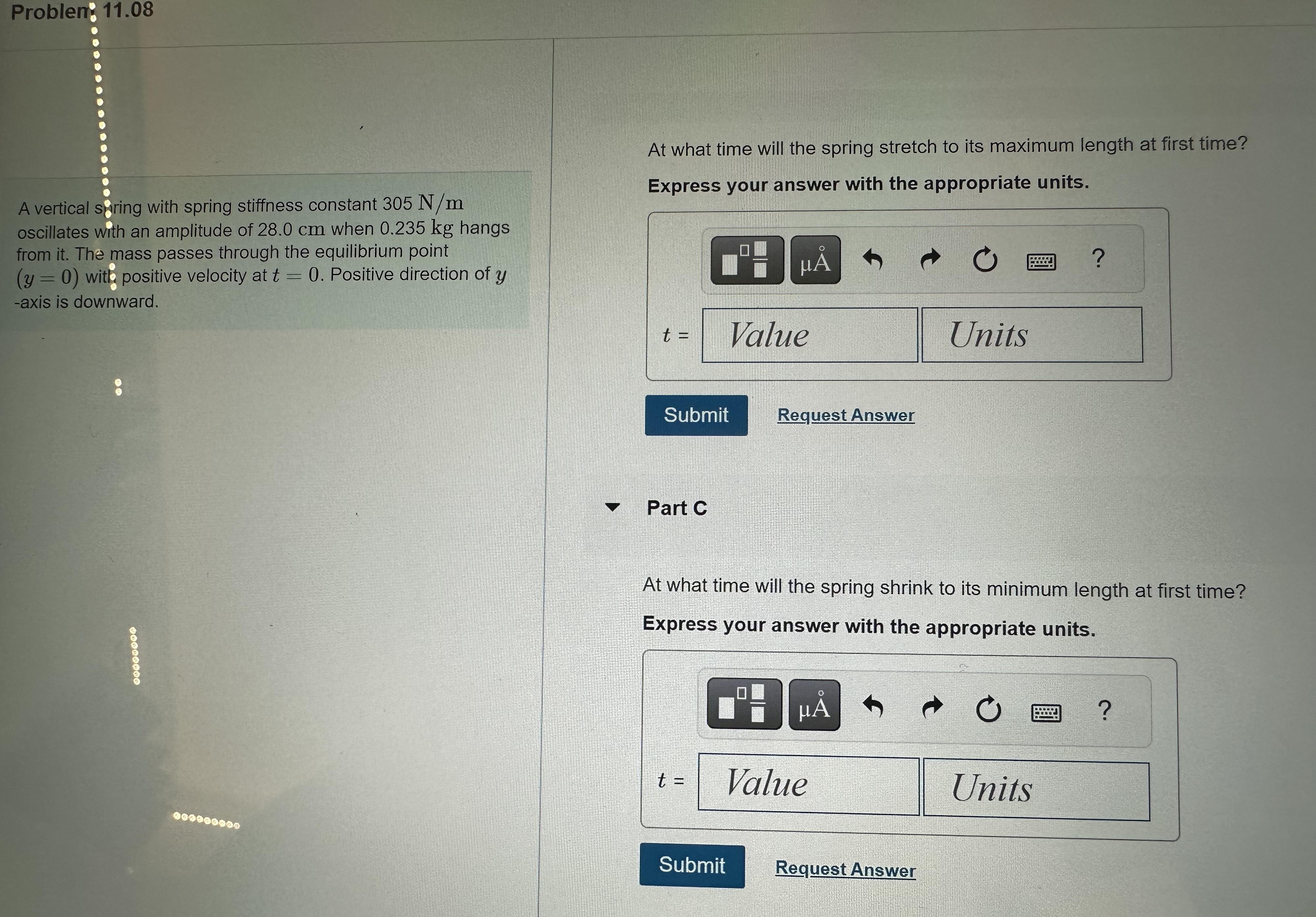with an amplitude of 28.0 cm when 0.235 kg hangs from it.