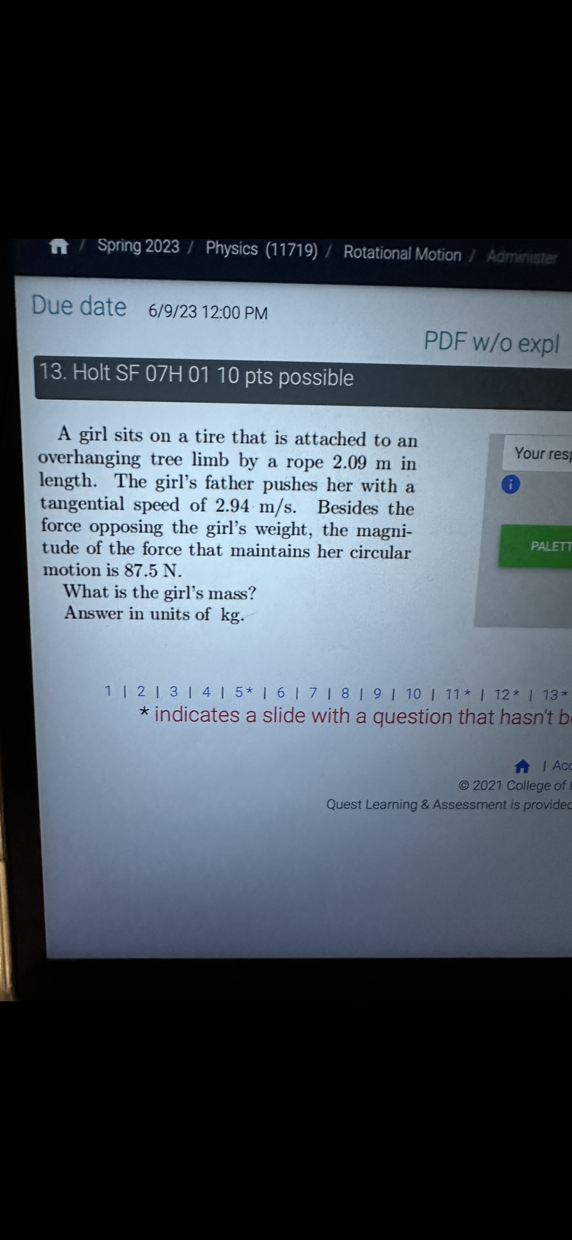 up & Solve \fA girl sits on a tire that is attached