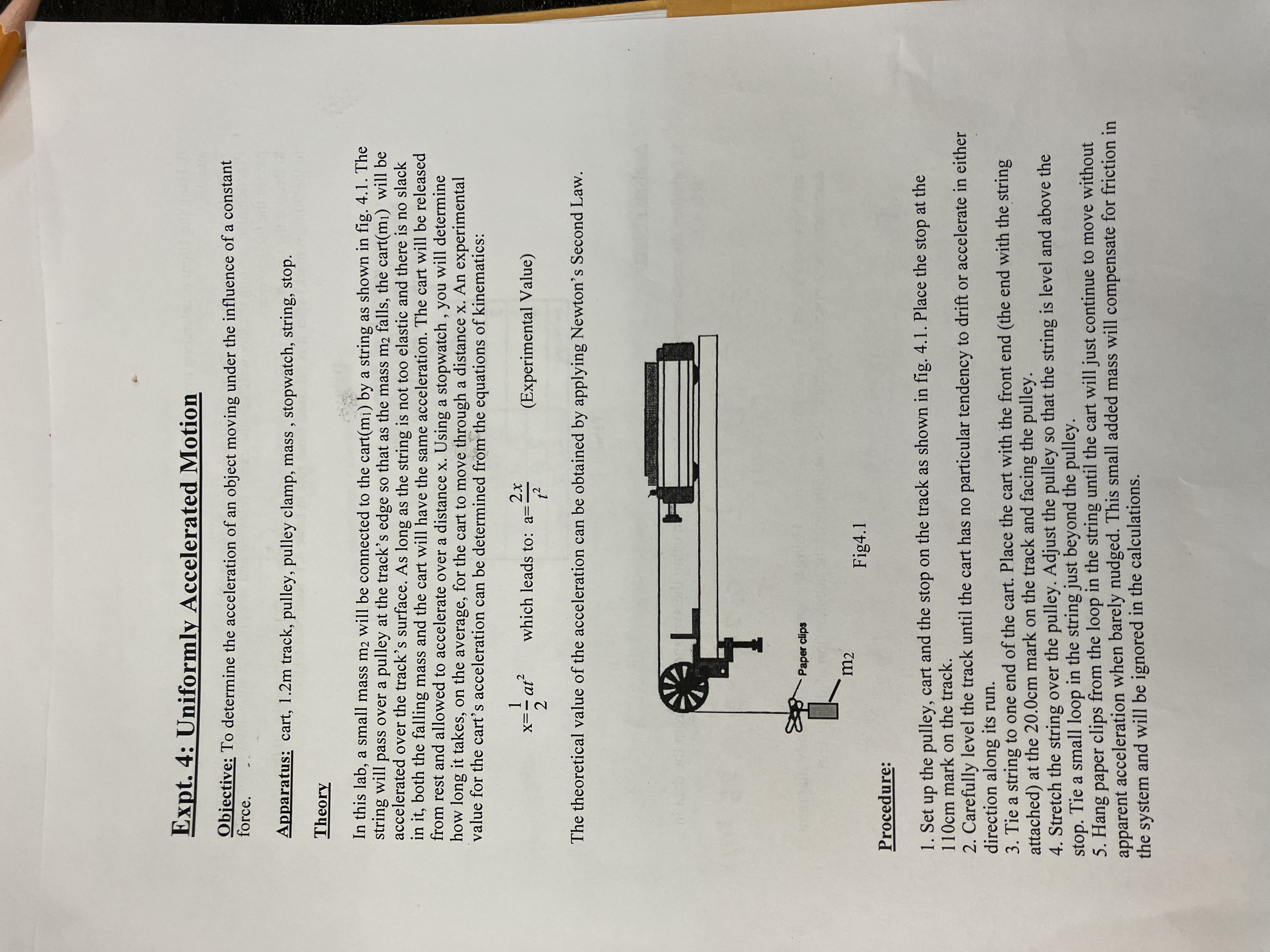 the string. Keep the paper clips attached. 7. Practice releasing the cart