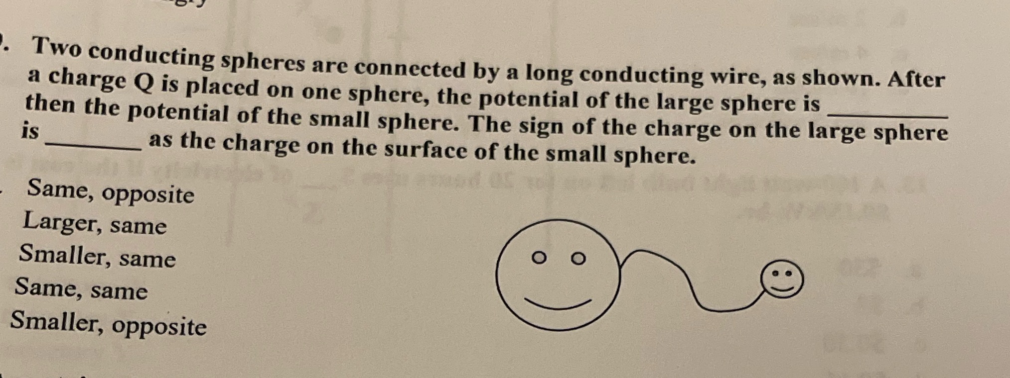  Two conducting spheres are connected by a long conducting wire, as