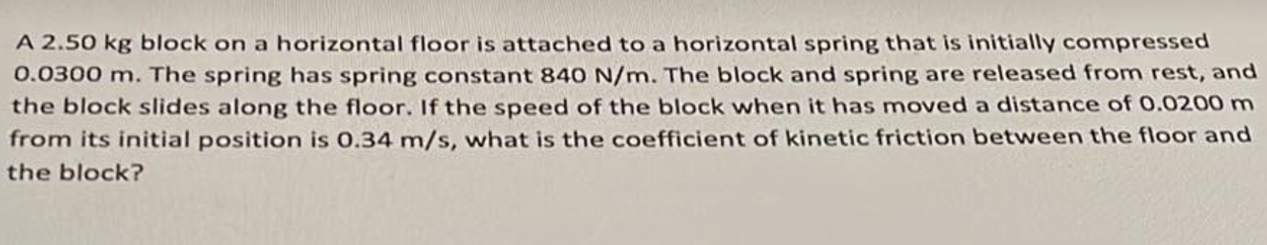  A 2.50 kg block on a horizontal floor is attached to