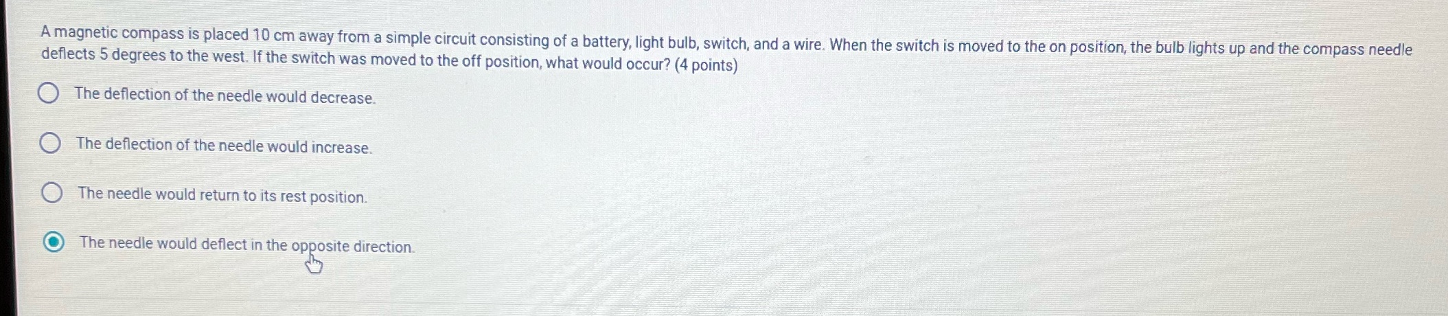  A magnetic compass is placed 10 cm away from a simple