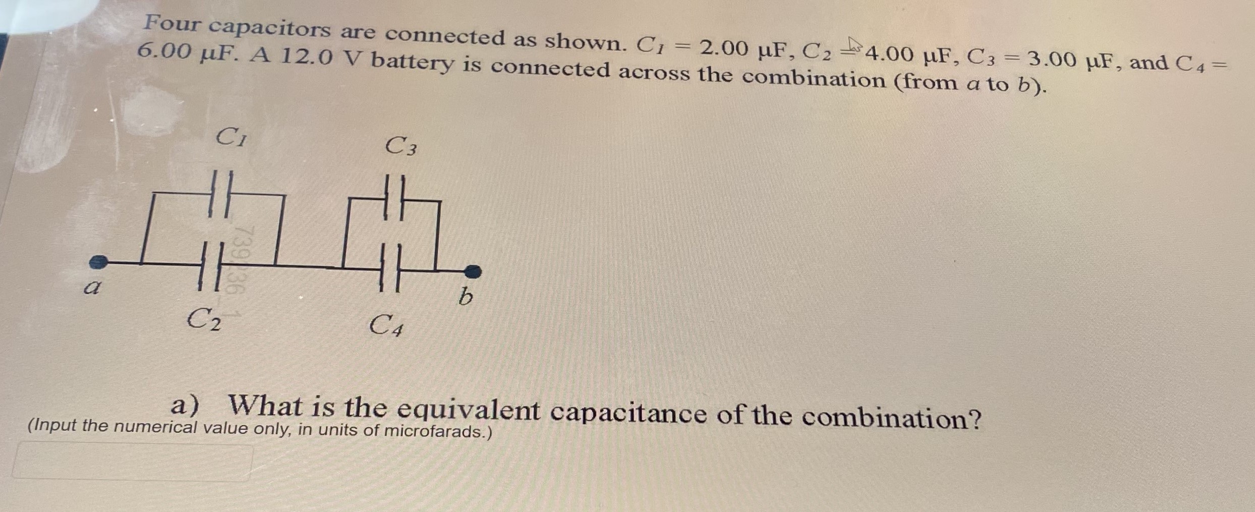 Four capacitors are connected as shown. C1 = 2.00 JF, C2