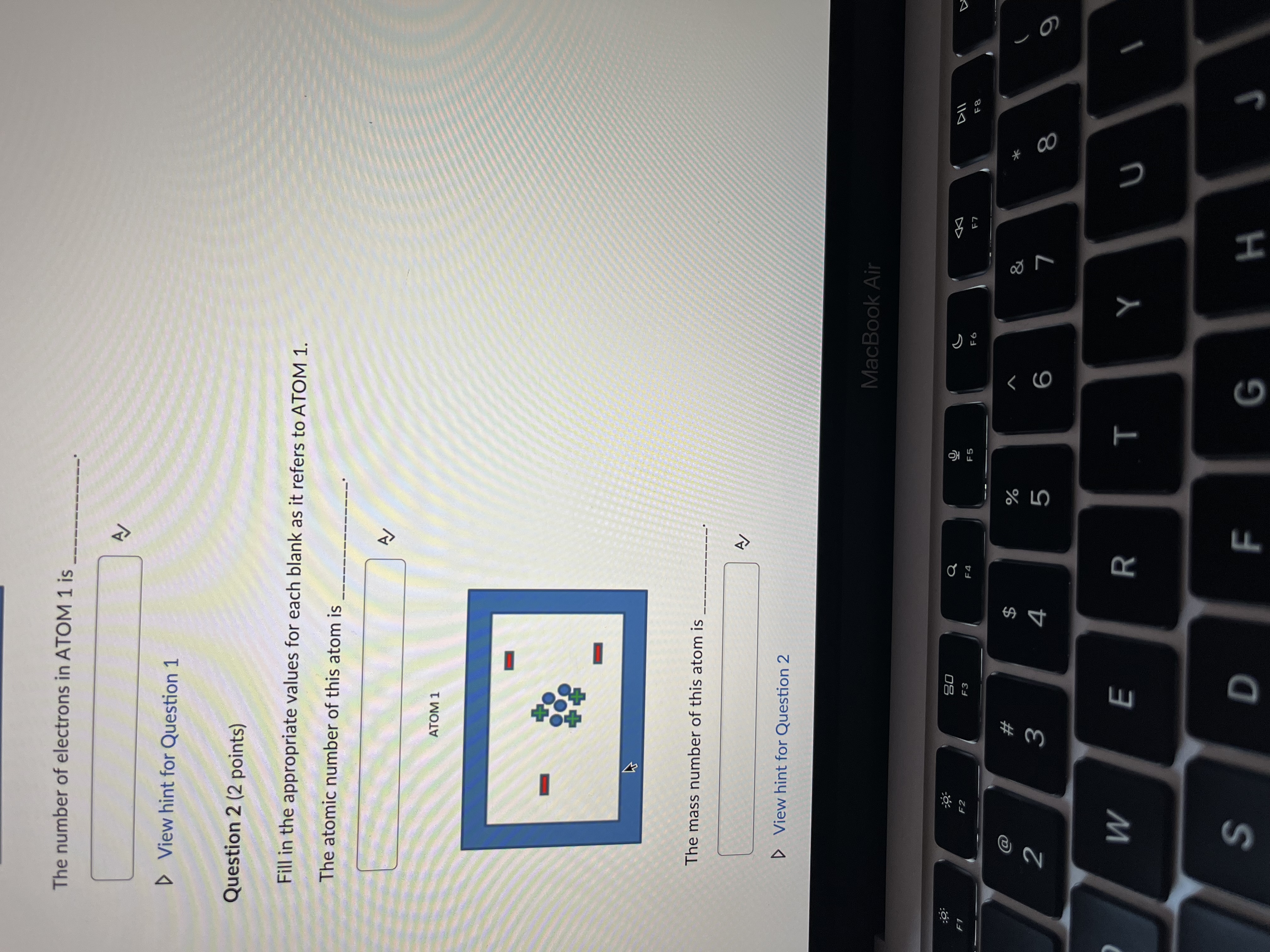 blank as it refers to ATOM 1. The number of protons present