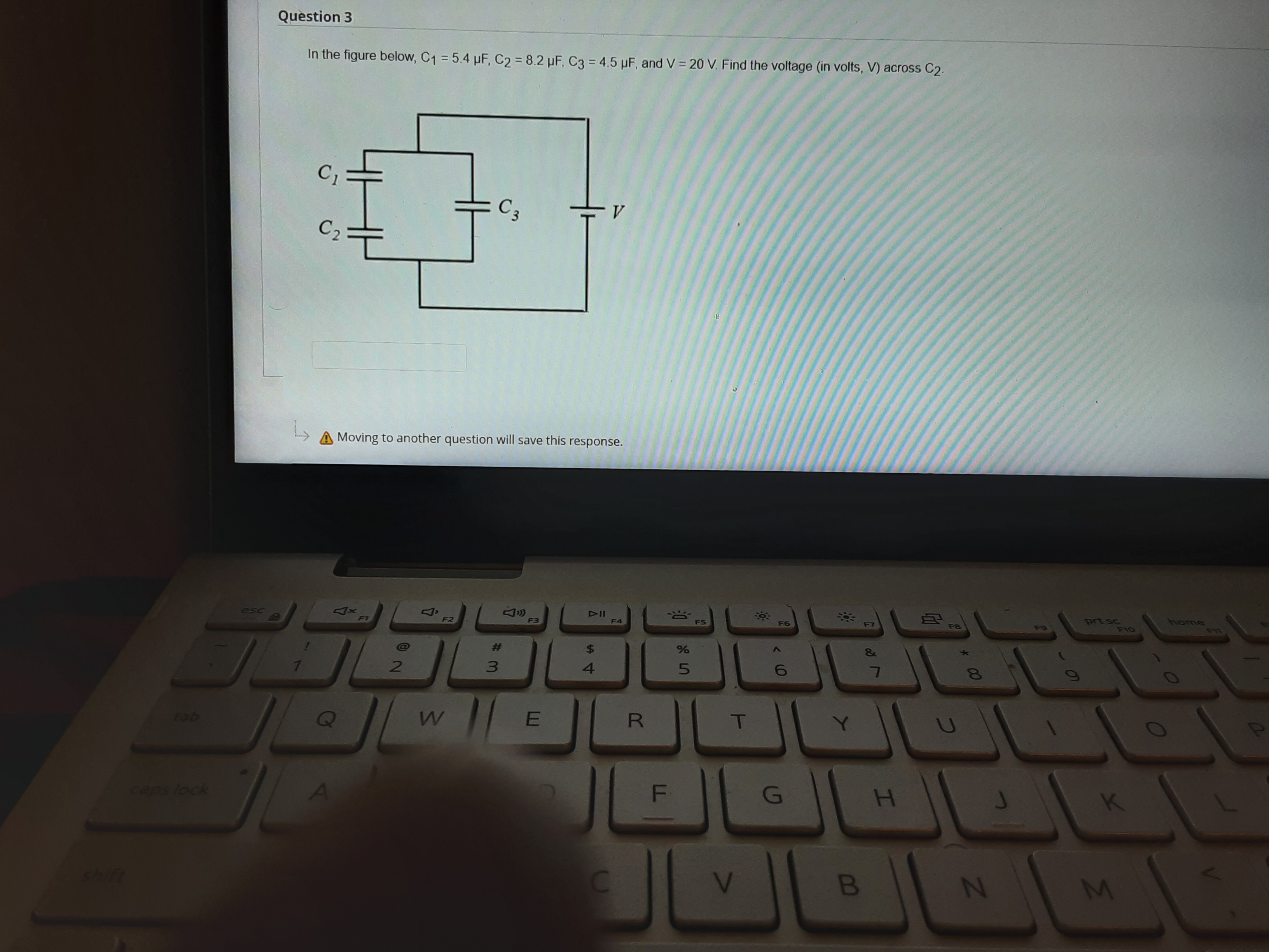 Question 3 In the figure below, C1 = 5.4 UF, C2