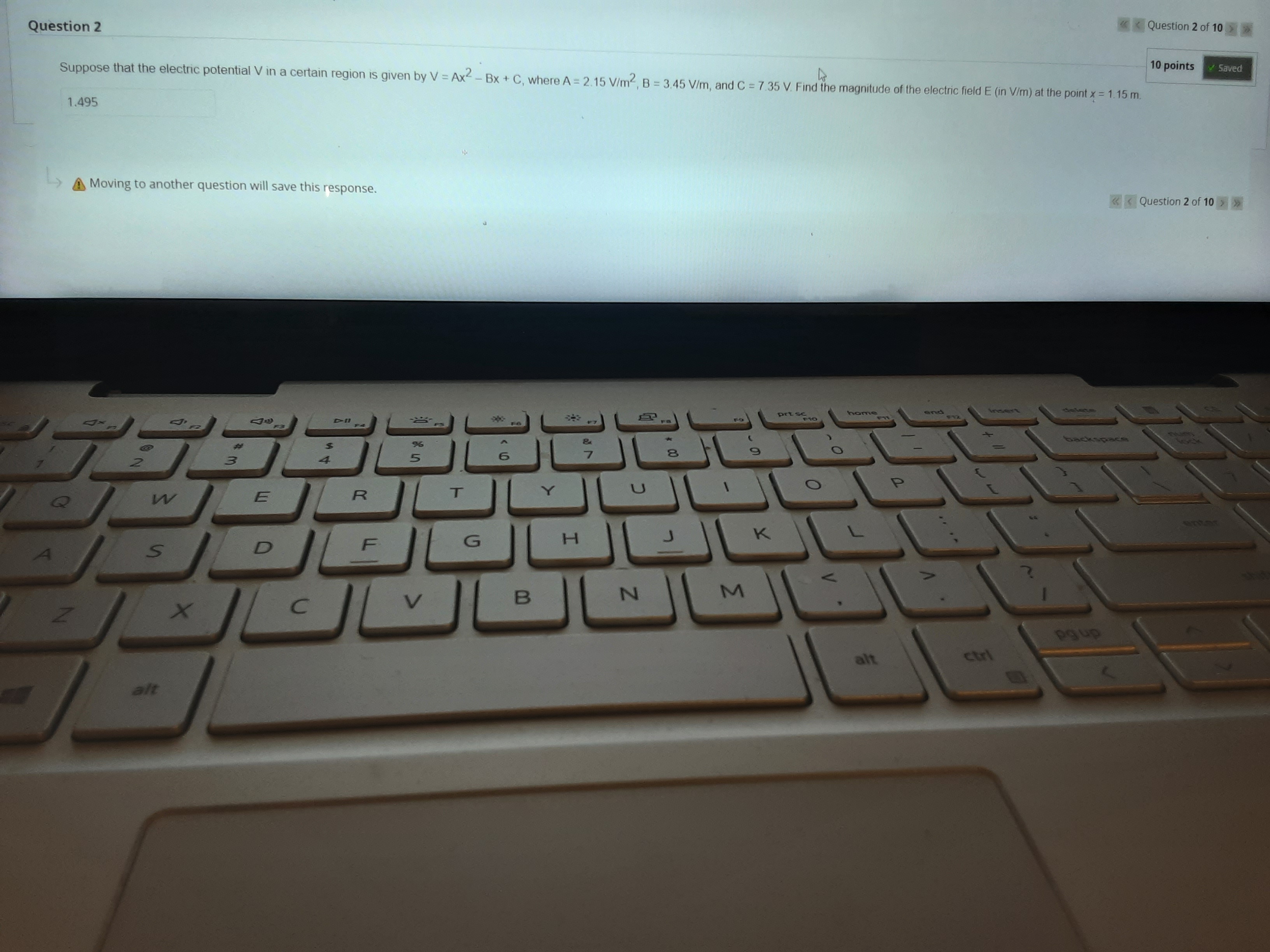 = 15.8 cm are charged to a potential difference V = 72.5