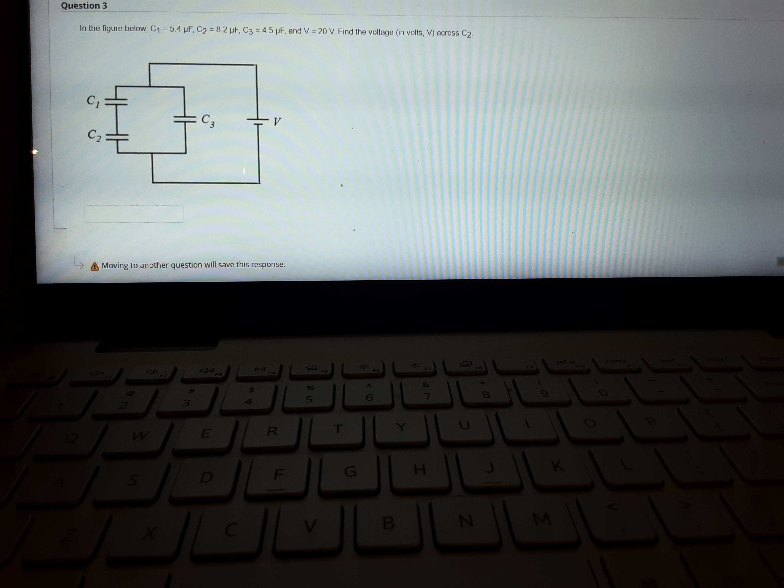 V, as shown in the figure below. A constant external force F