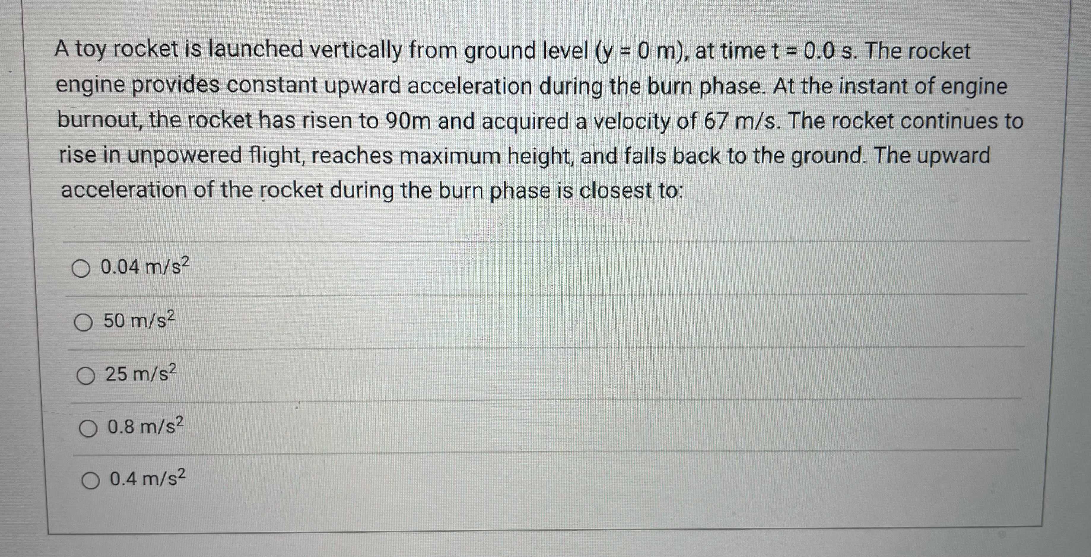  A toy rocket is launched vertically from ground level (y =