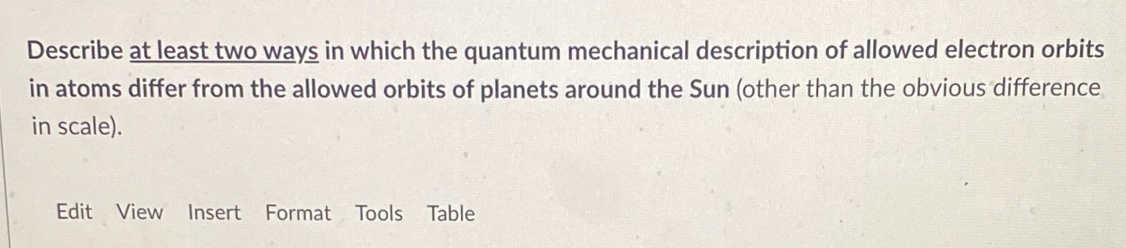  Describe at least two ways in which the quantum mechanical description