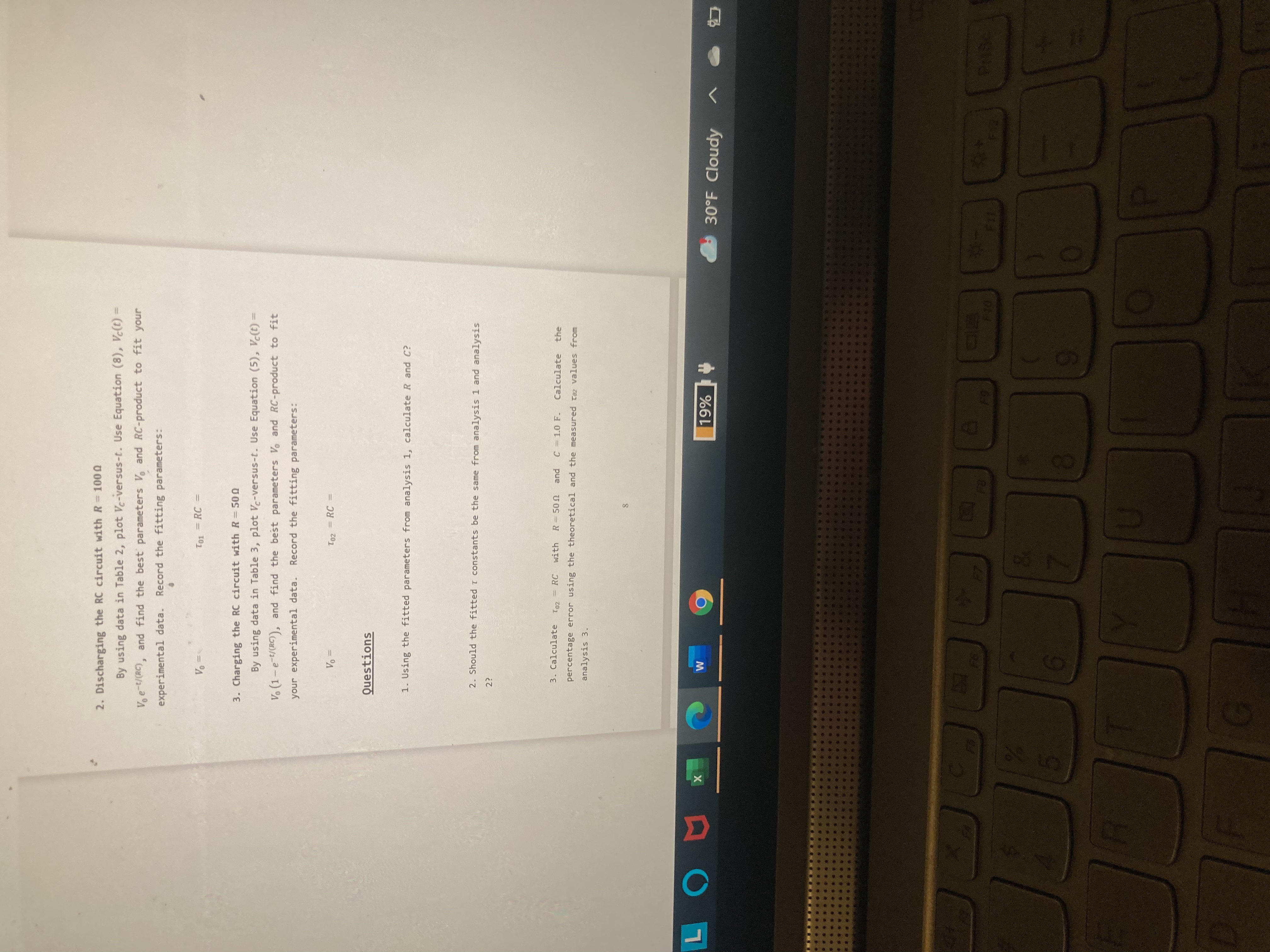 potential difference of V between the two terminals of a capacitor of