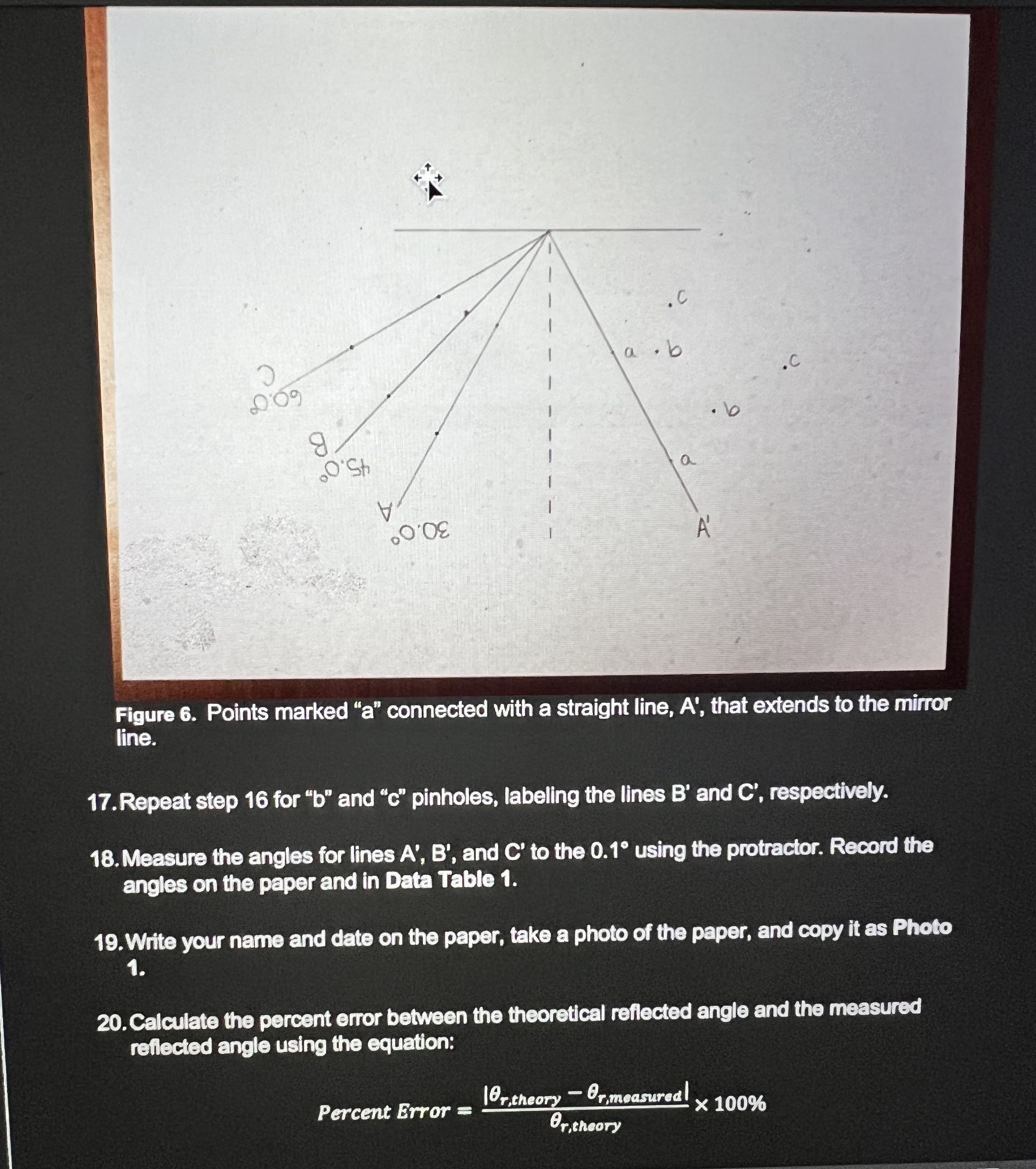 below the mirror line connecting "1" and "2" pinholes. The connecting lines