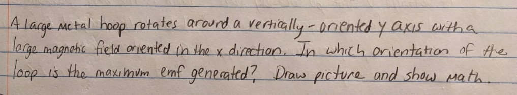 A large metal hoop rotates around a vertically - oriented y